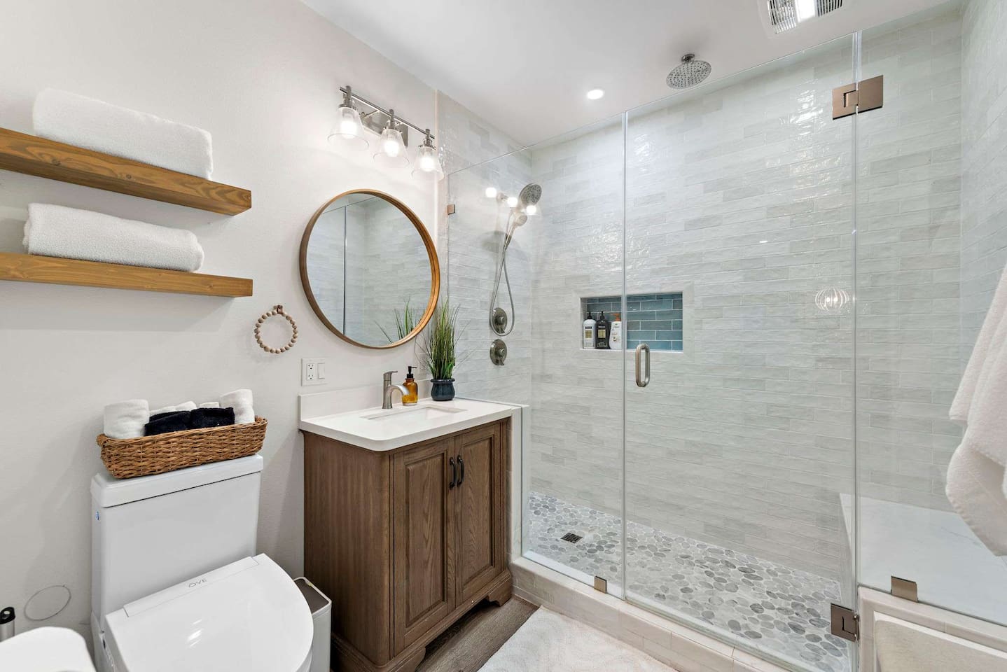 Enjoy our spa-like bathroom and shower for two!  Both the rain shower head and regular shower work at the same time!  The property has a water softener so the water feels silky and luxurious.