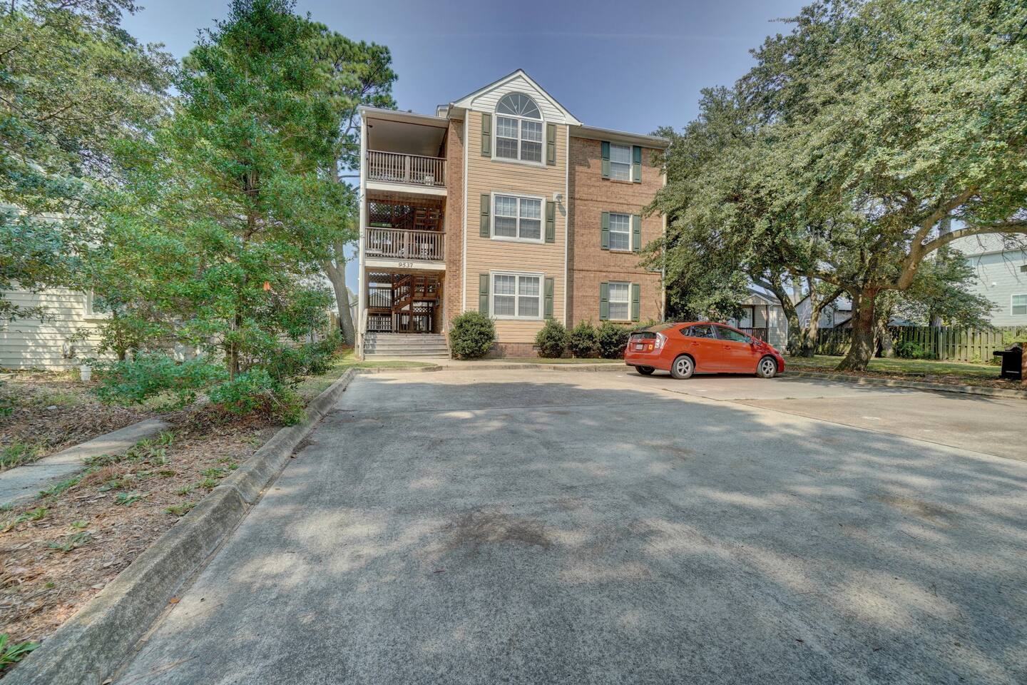 front of building.  with parking for 2 cars