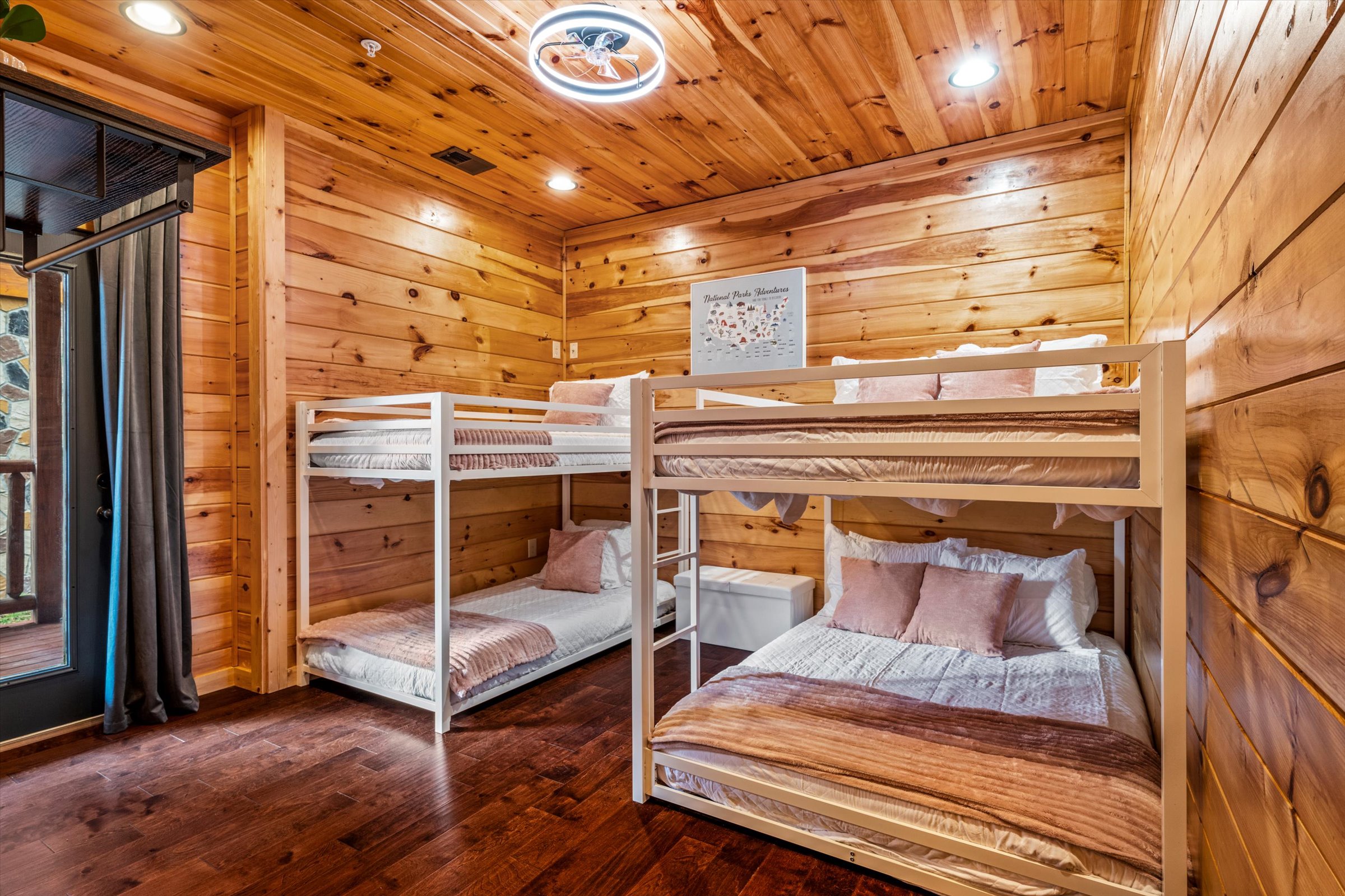 Bedroom 9 (downstairs) has a twin over twin bunk bed and a full over full bunk bed.  It also shares a Jack & Jill bathroom with Bedroom 8.