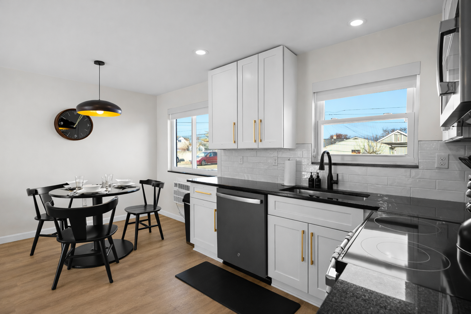 Bright, open kitchen and dining space with modern finishes, ample counter space, and natural light—perfect for cooking, dining, and everyday living.