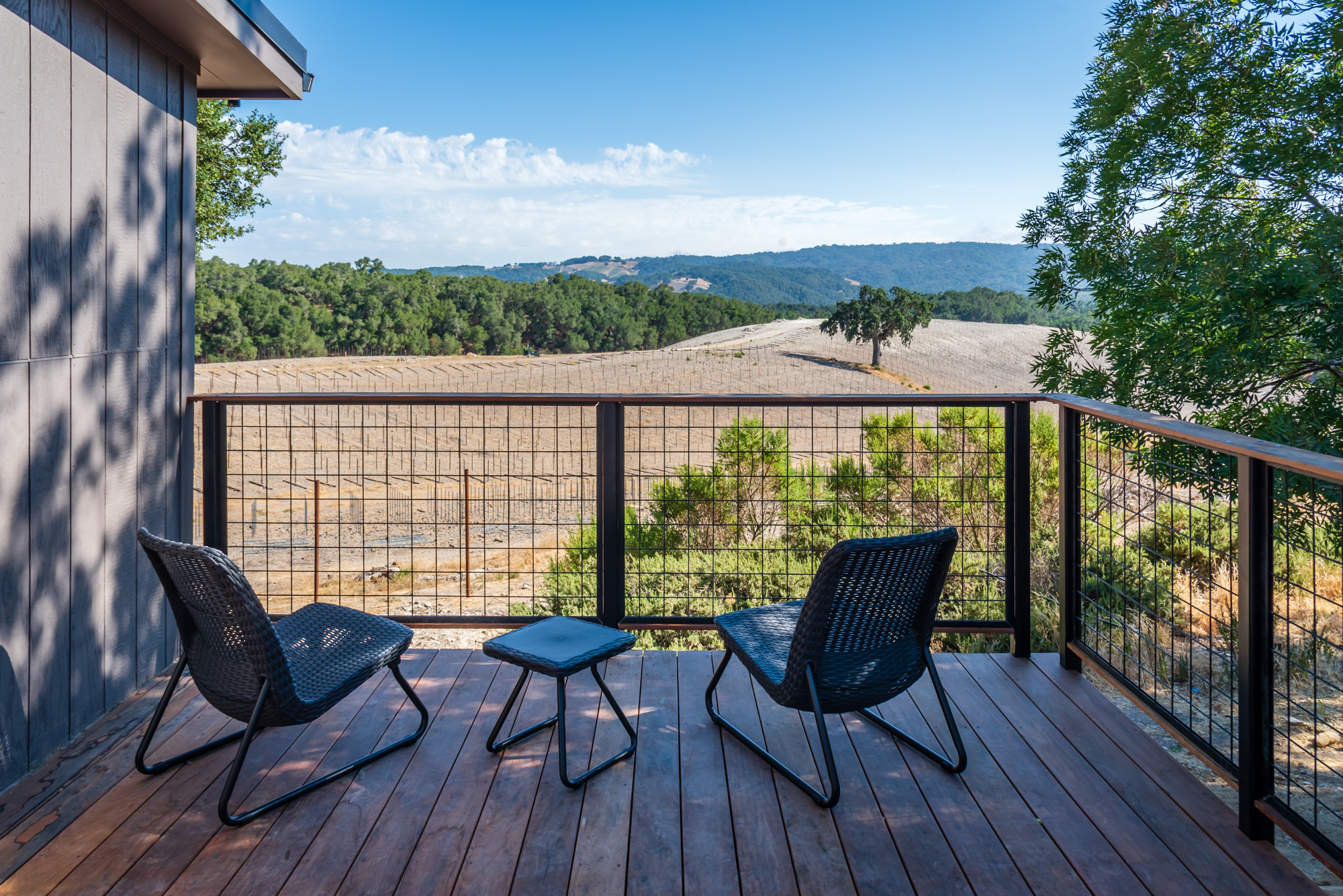 Soak in sweeping vineyard views from the private deck.