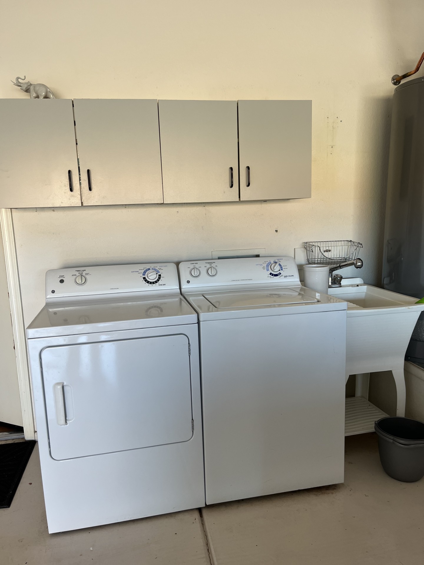 Full size washer and dryer are in the attached garage, off the kitchen