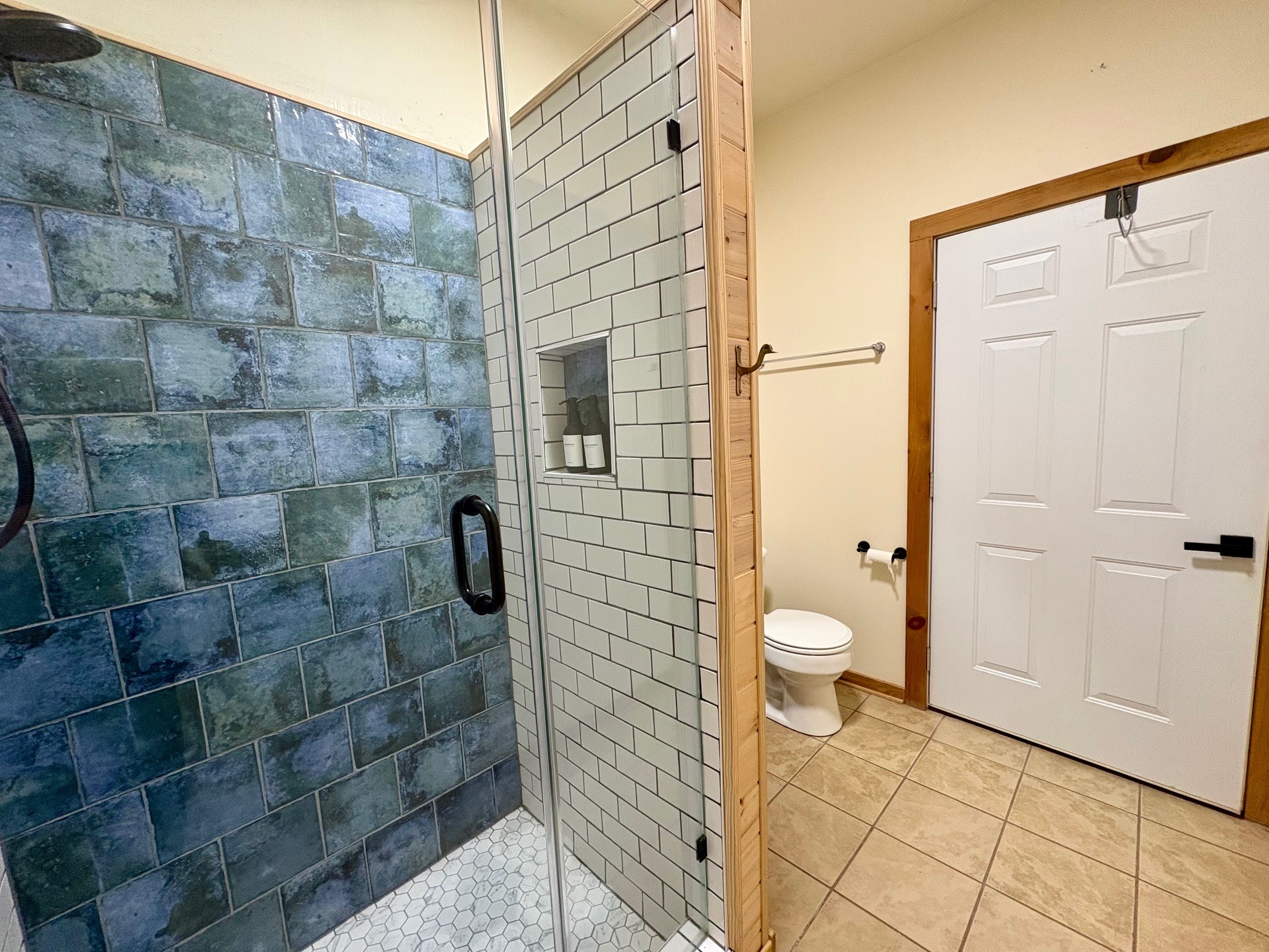 Custom tile shower in the ground floor bath.