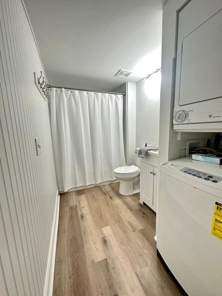 Bathroom with washer and dryer