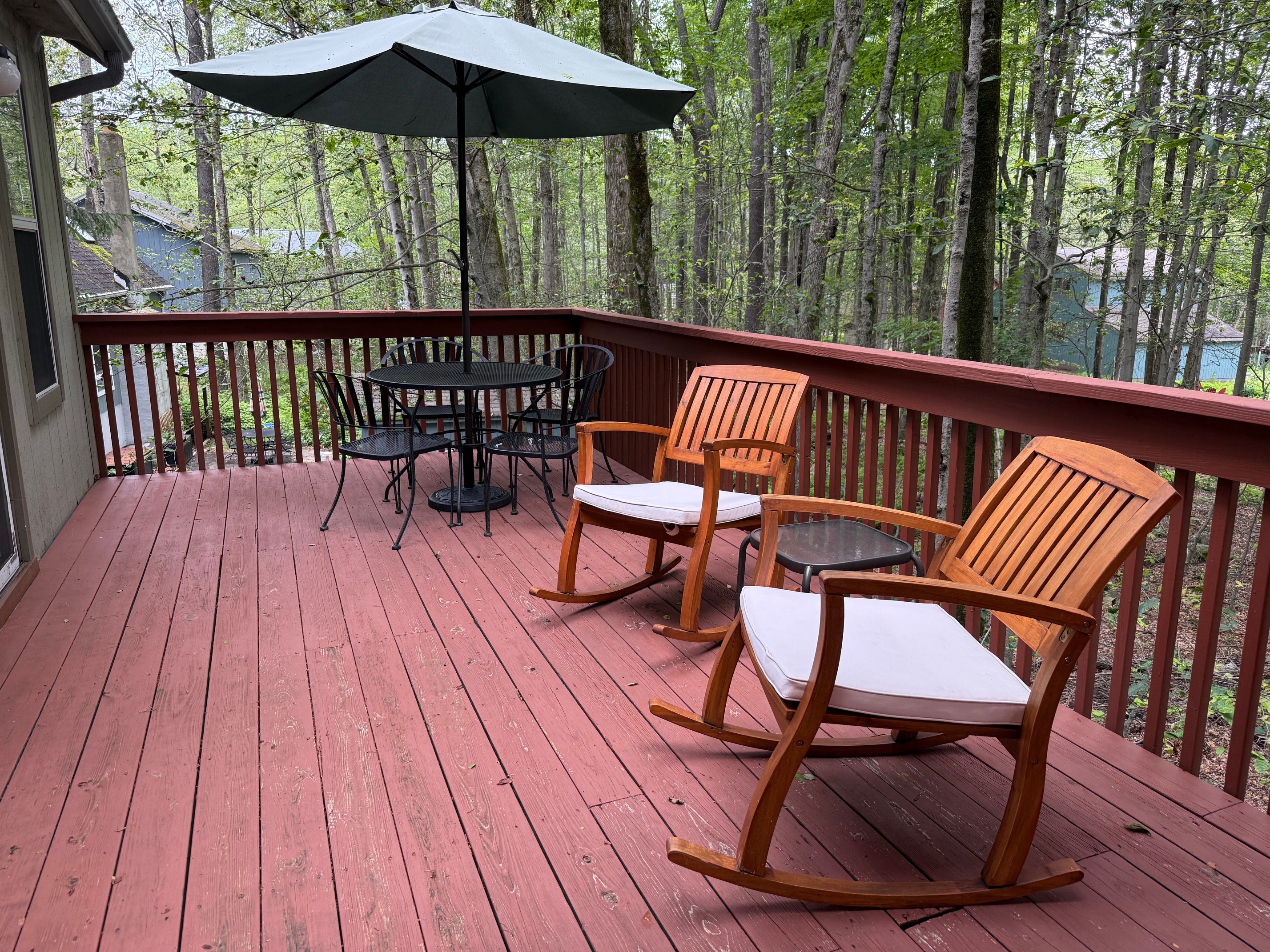 Tables, seating and BBQ on deck