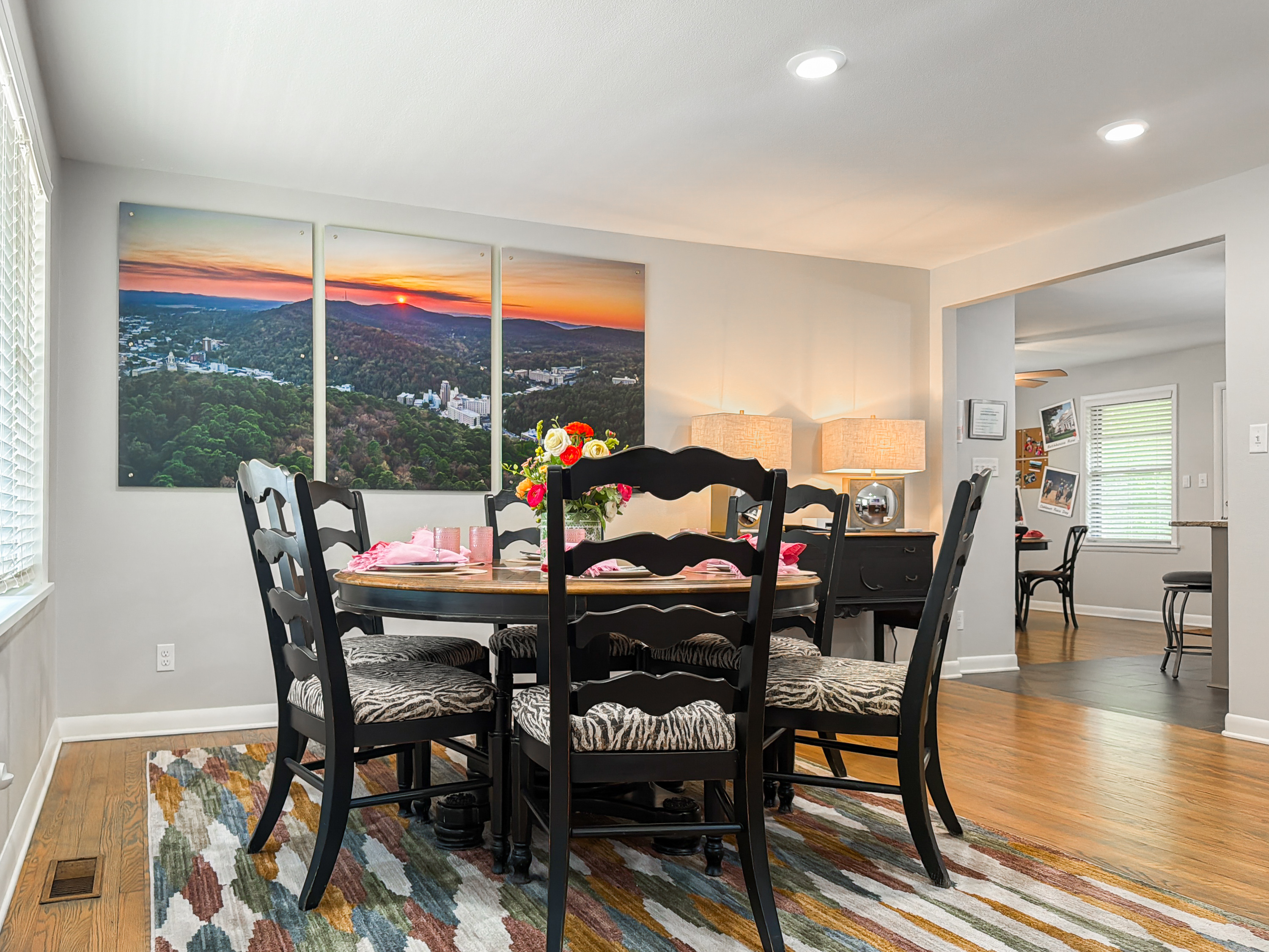On the other side of the room is the format dining area.