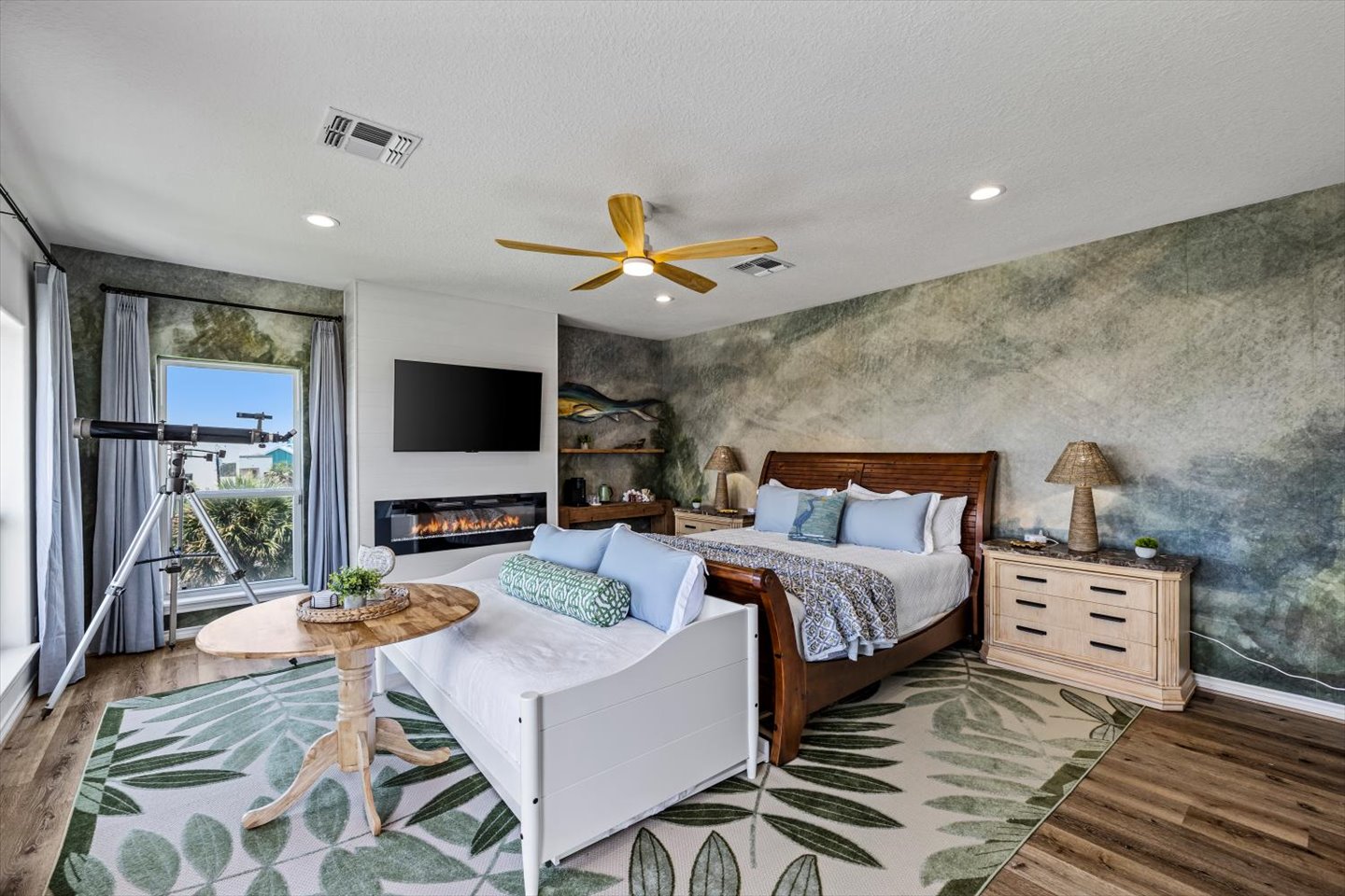 The Intracoastal Waterway Suite is stunning!  Upstairs Primary King Suite –Spacious king retreat with coffee bar, cozy electric fireplace, and a 55” smart TV. Step onto the upper-level deck for amazing beach views—or stay tucked in and watch! 