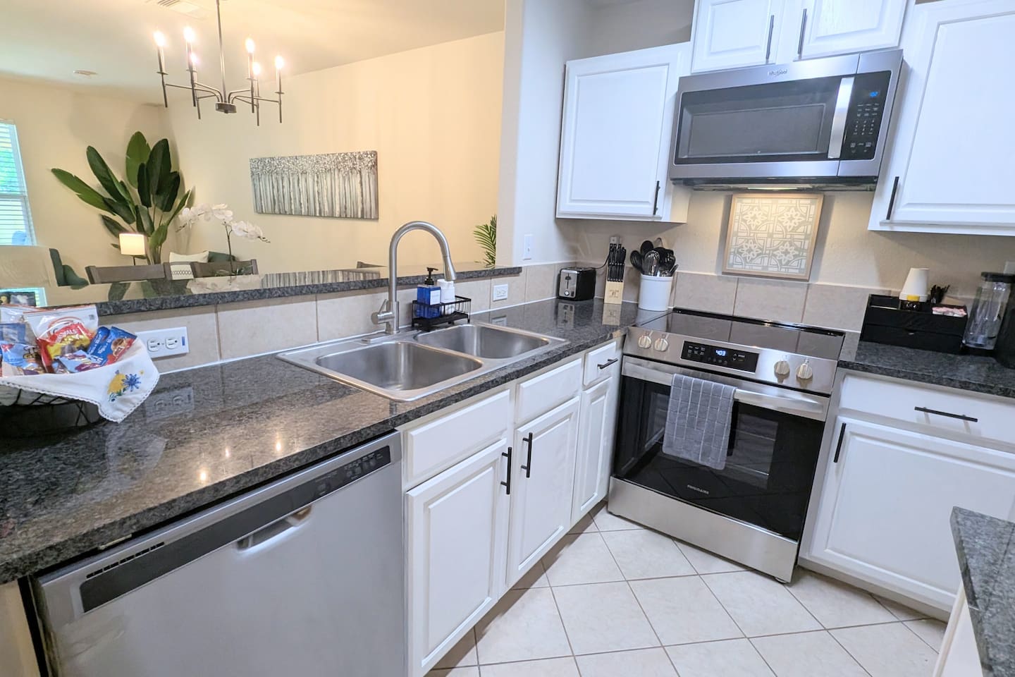 Cook up some family fun in this fully stocked kitchen complete with stove, oven, microwave, dishwasher, and fridge. 