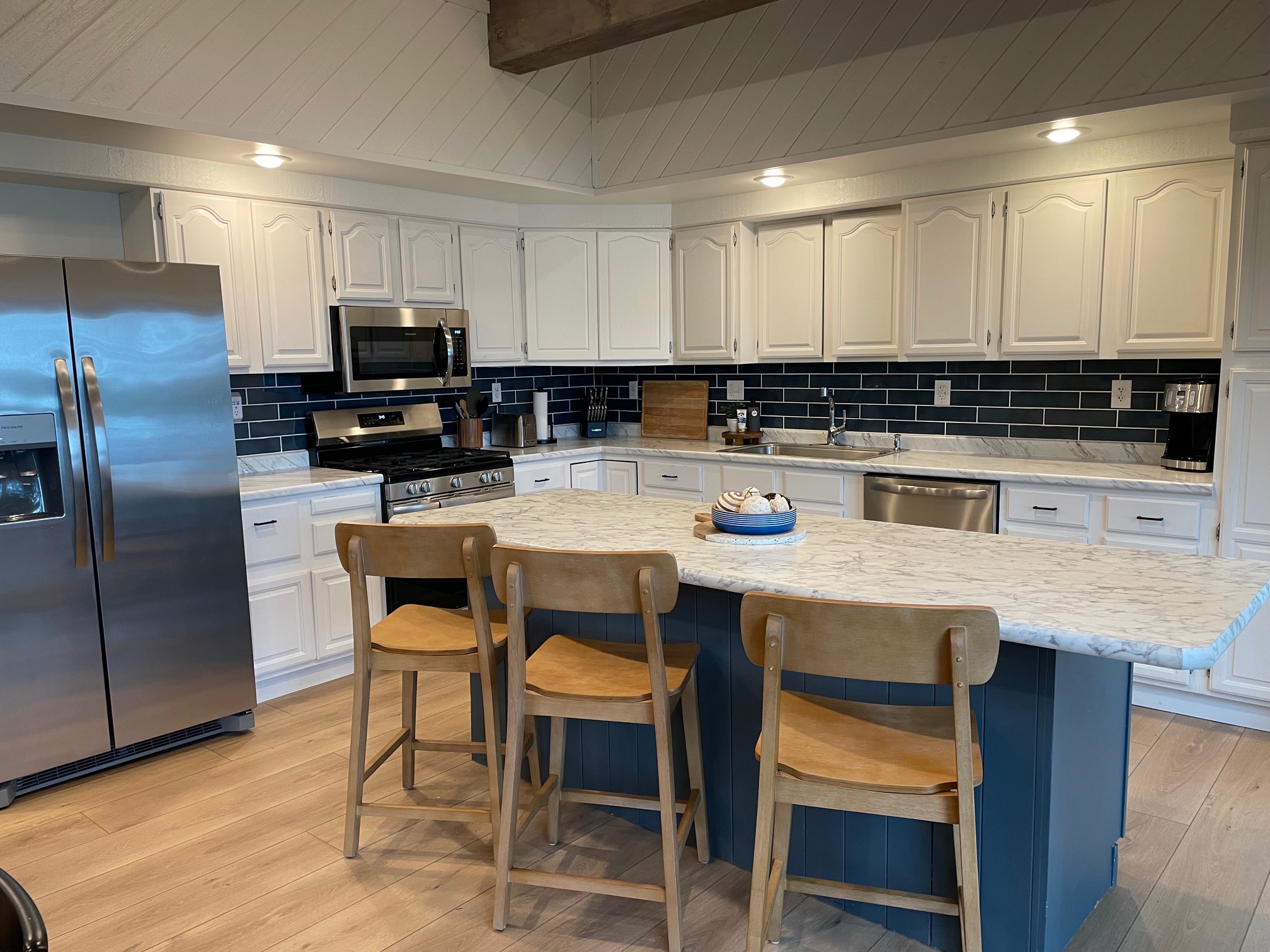 Fully equipped kitchen with large pantry cabinet for food storage