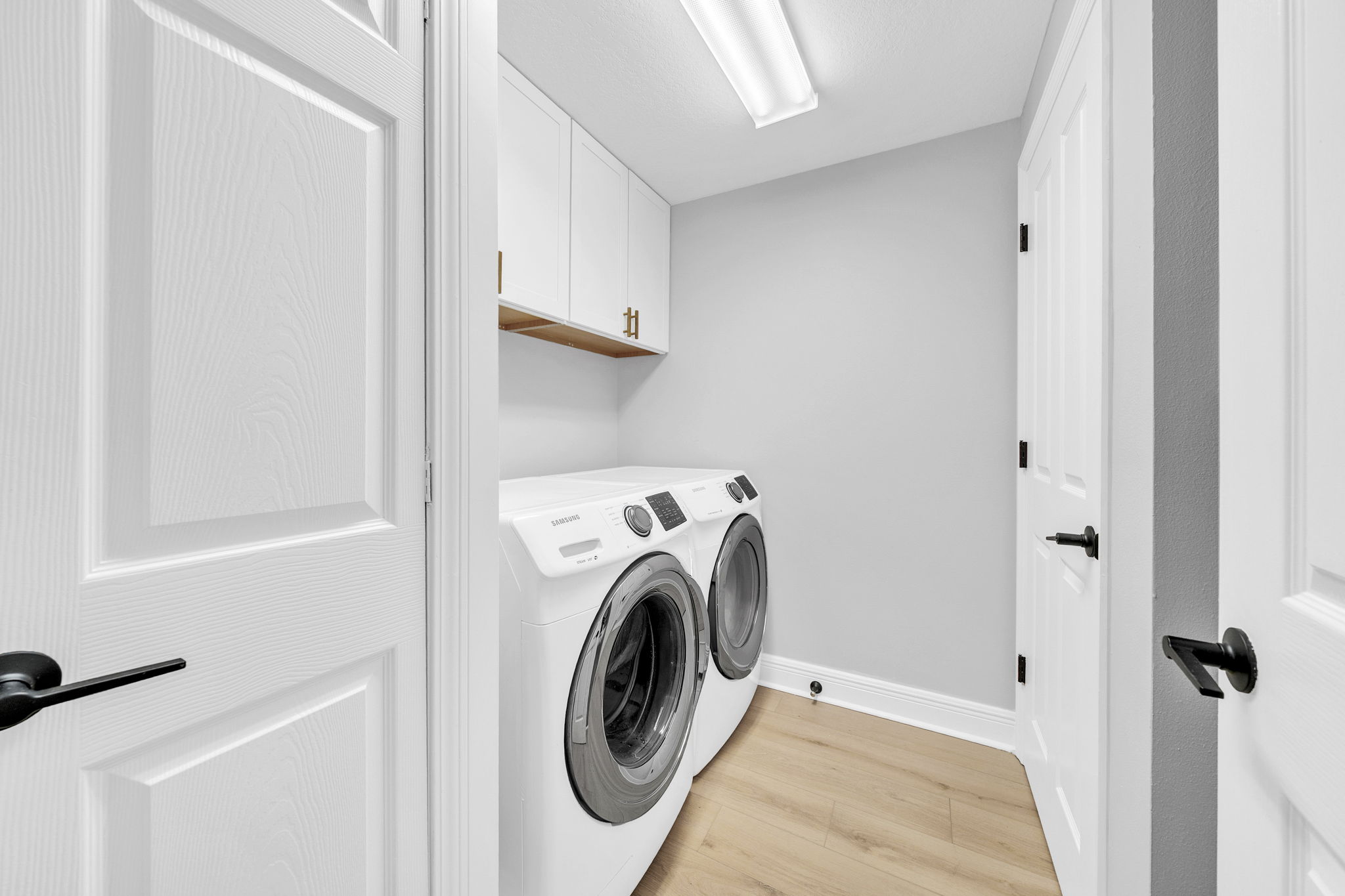Full-size washer and dryer make it easy to keep up with laundry during your stay, with a drying rack perfect for air-drying swimsuits and delicates. Upper cabinets provide extra storage and are stocked with games and puzzles for downtime and family fun.