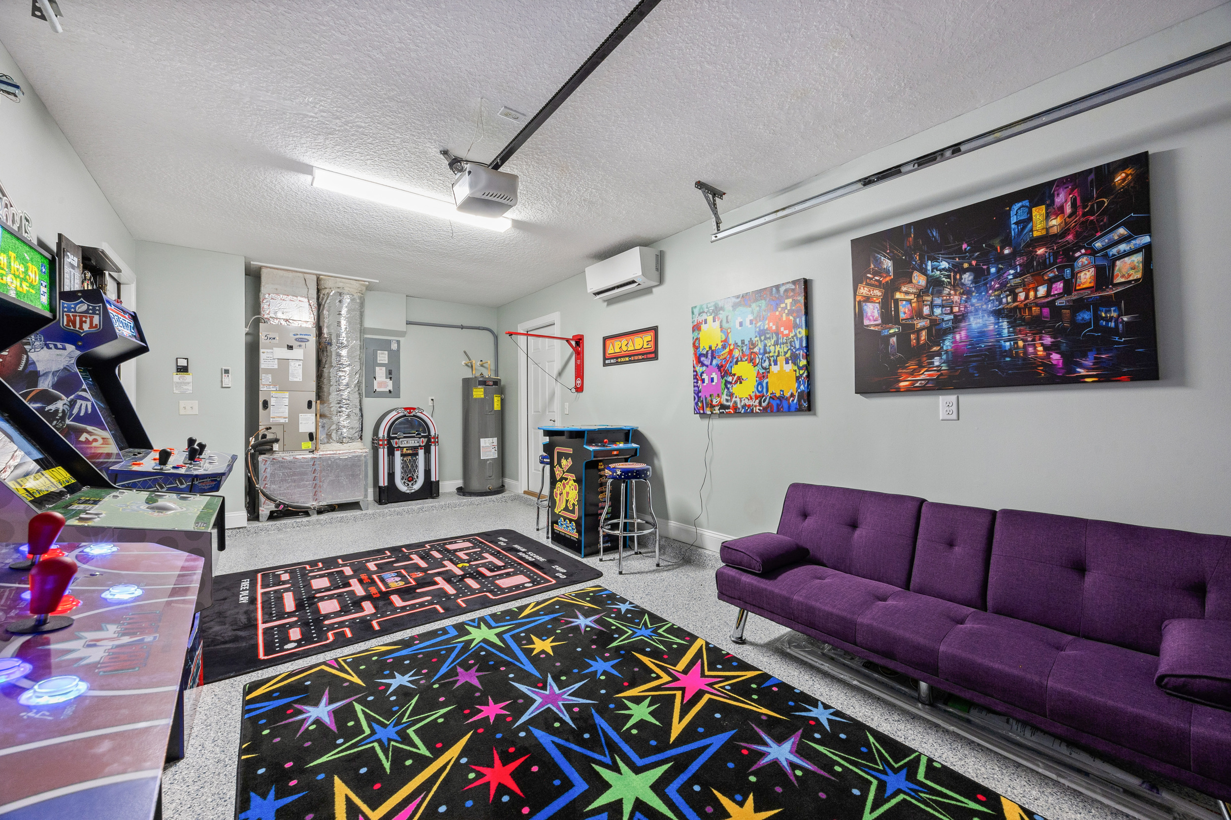 Game room with retro arcades and lounge area