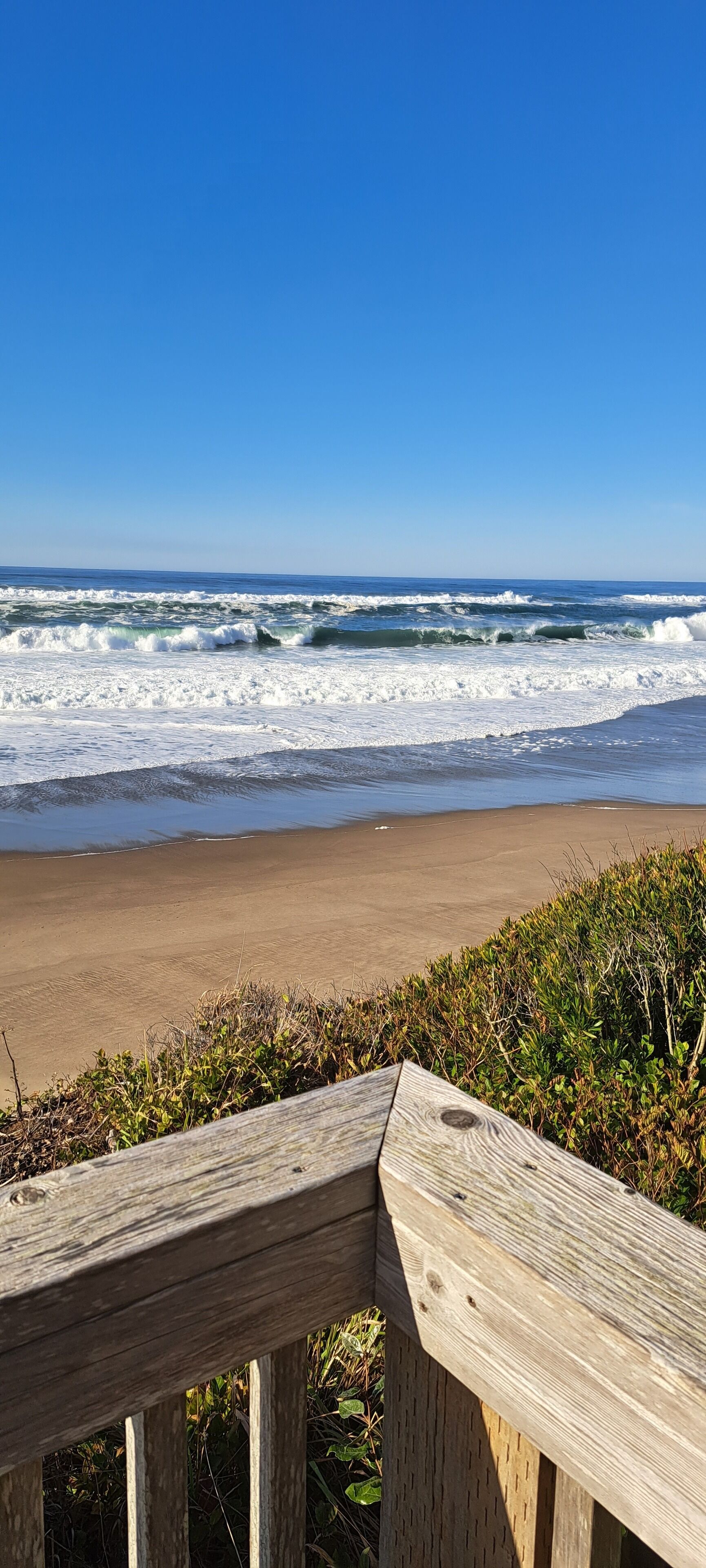 Stroll through the Bella Beach neighborhood, where every path seems to lead straight to the beach.