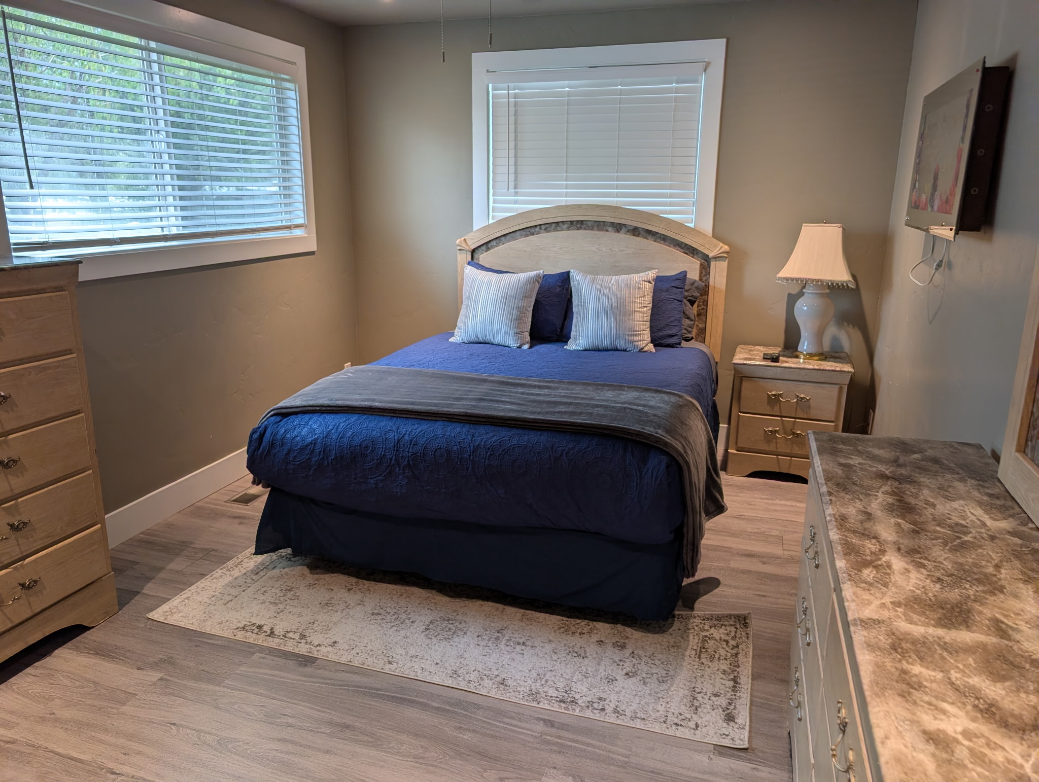 Enjoy this queen bed with a smart tv