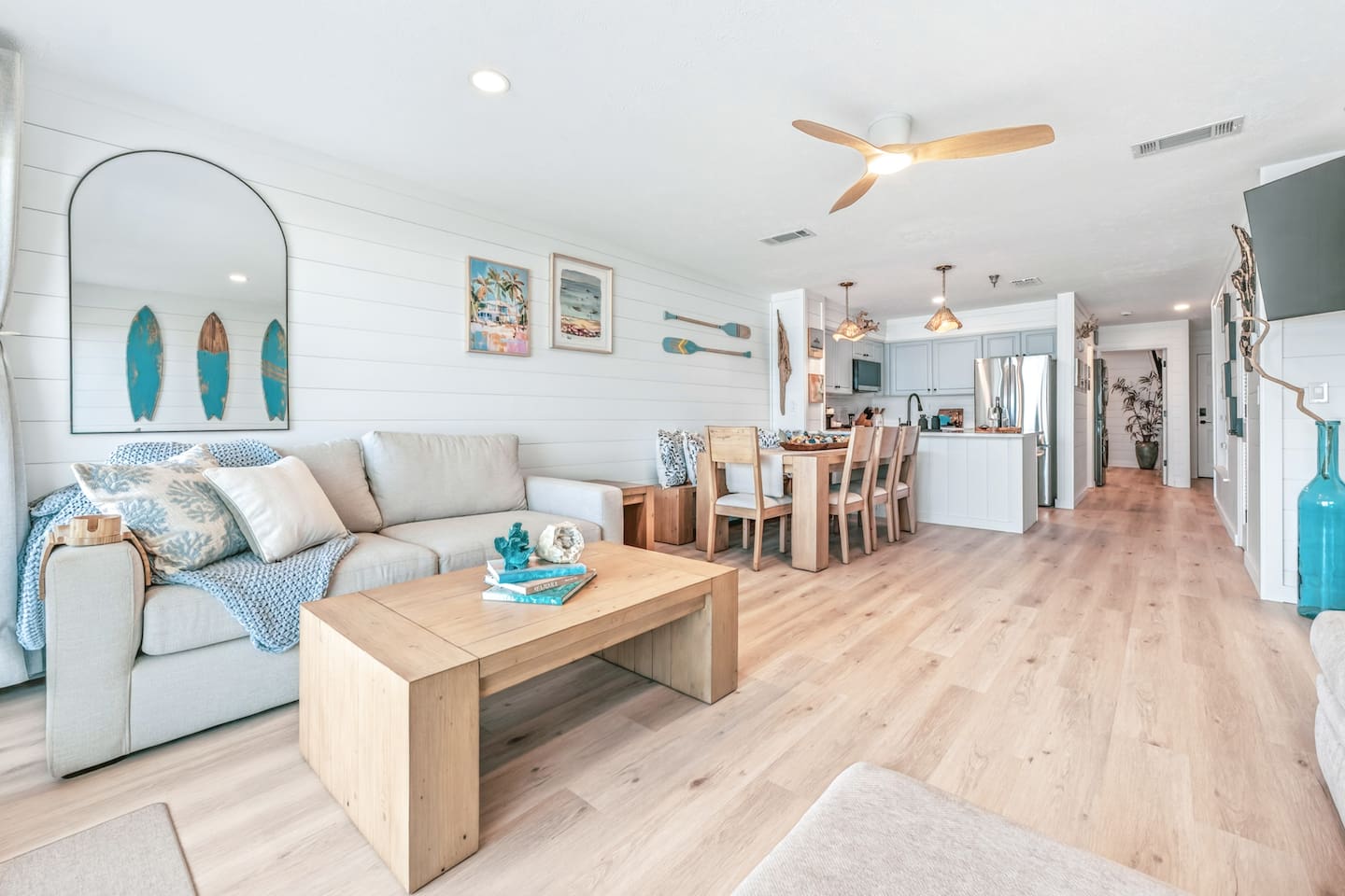 Inviting family-friendly living room with sleeper sofas and ocean views