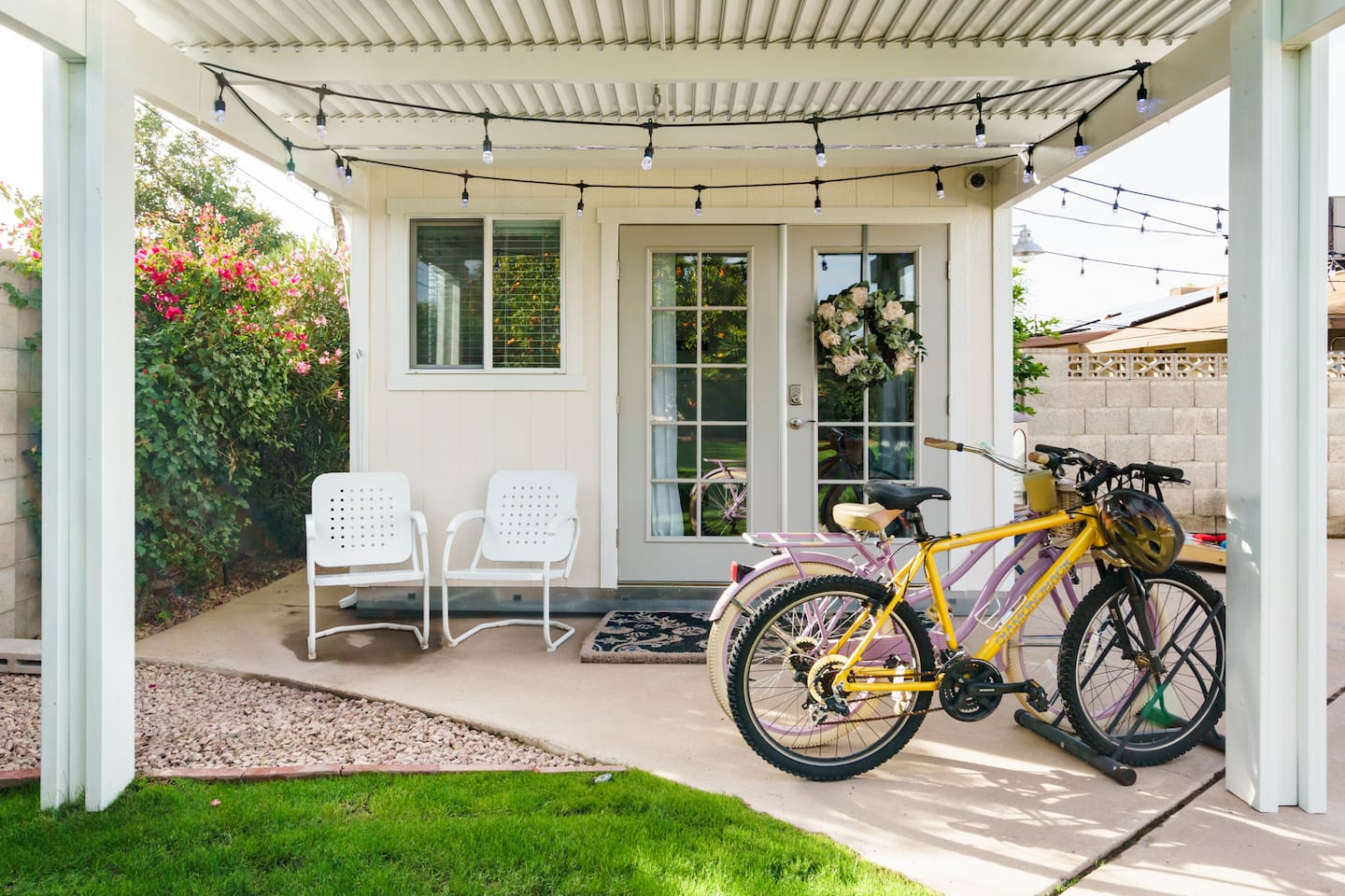 Backyard Garden Room – Comfortable private room with mini-split, TV, and workspace. Sleeps 1.
Note: Bikes are not currently available.