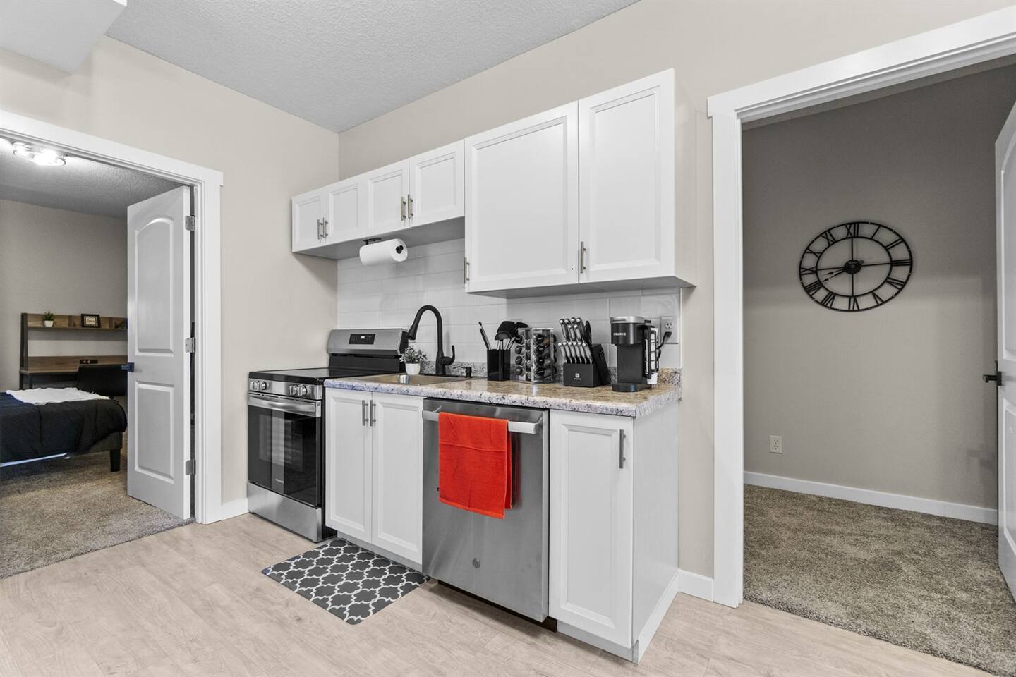 Fully stocked kitchen featuring brand-new cabinets, sleek countertops, and modern appliances for all your cooking needs.