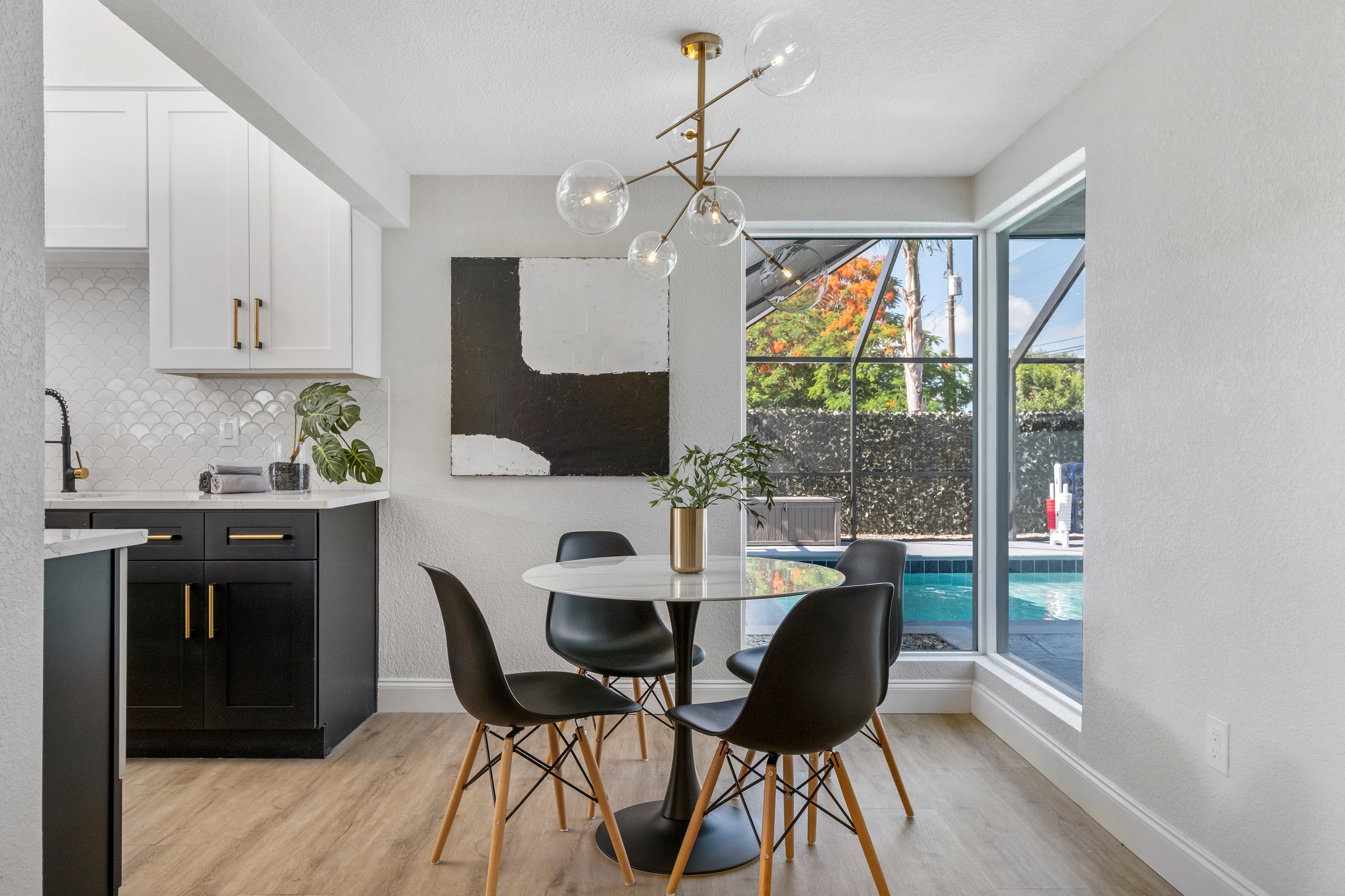 Breakfast nook overlooking the pool with extra large windows