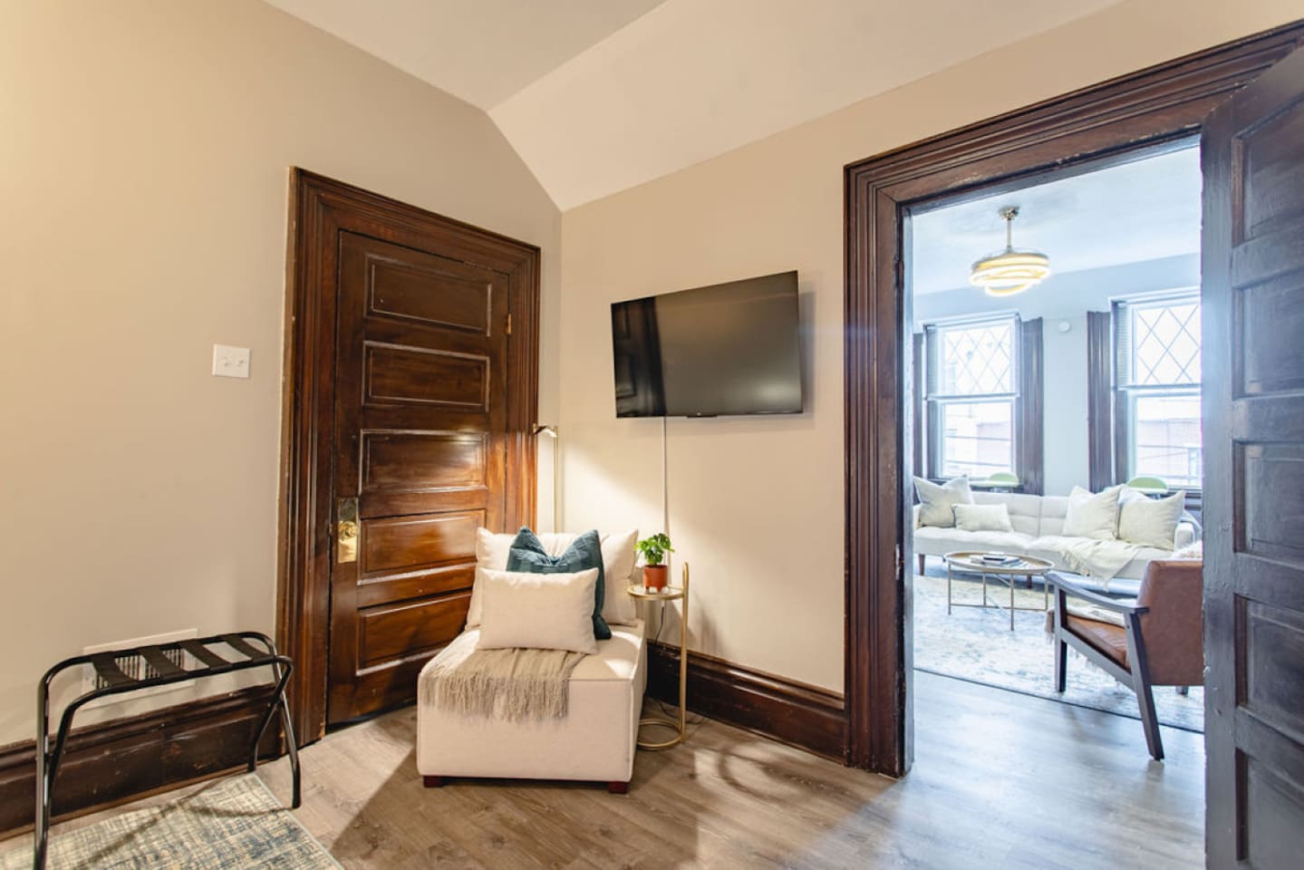 Cozy sitting area with a comfortable chair and TV, perfect for relaxing and enjoying your favorite shows or movies.