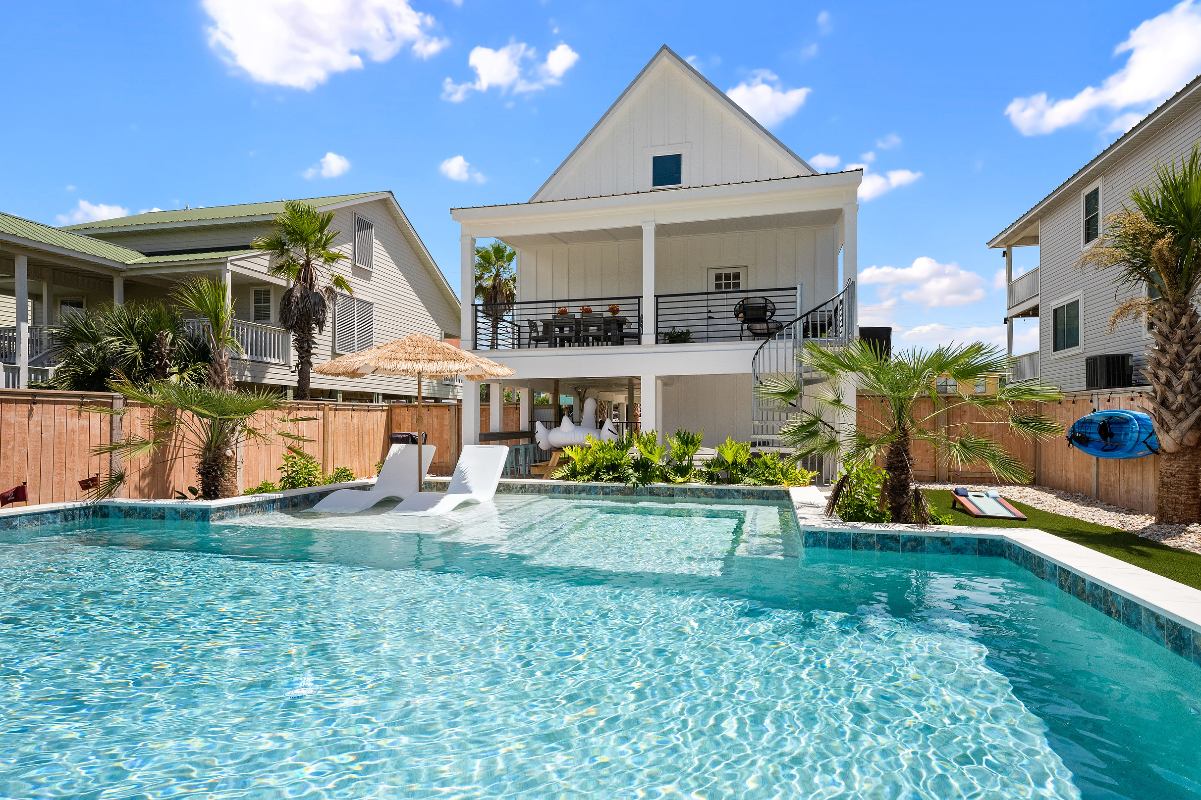 The private pool sits right outside the house for easy all-day family fun.