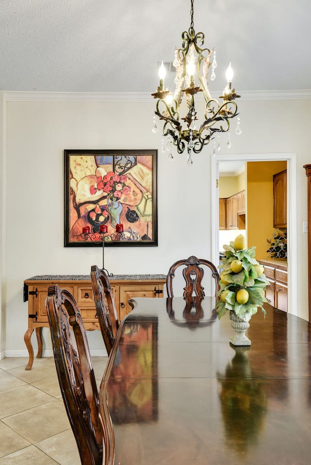 This butler's pantry connects the formal dining room to the kitchen adding additional counterspace for serving meals.