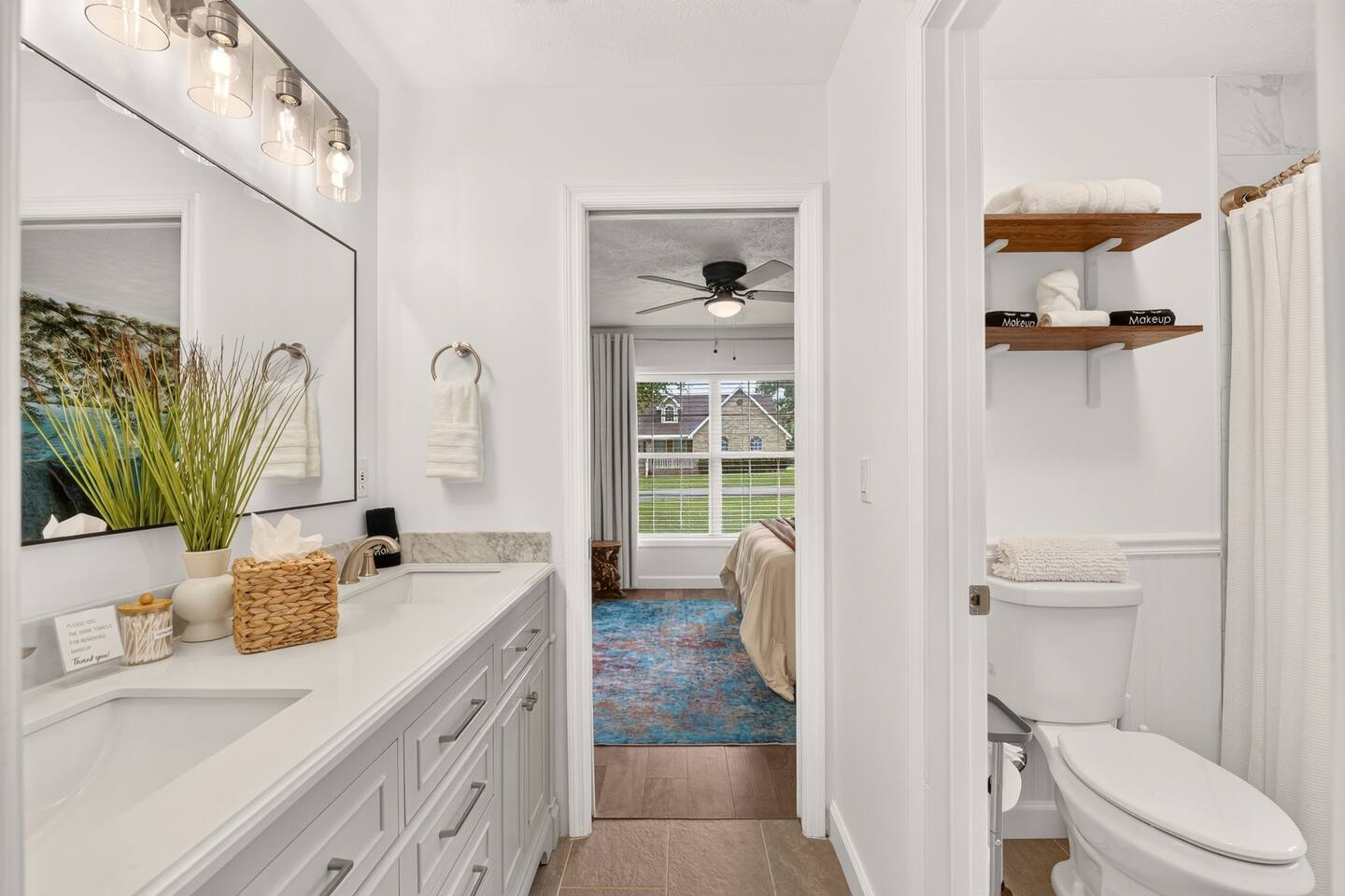 Bathroom #2 is located conveniently between bedrooms 2 and 3-Jack and Jill style.  This bathroom features a double sink and a private shower and toilet room.