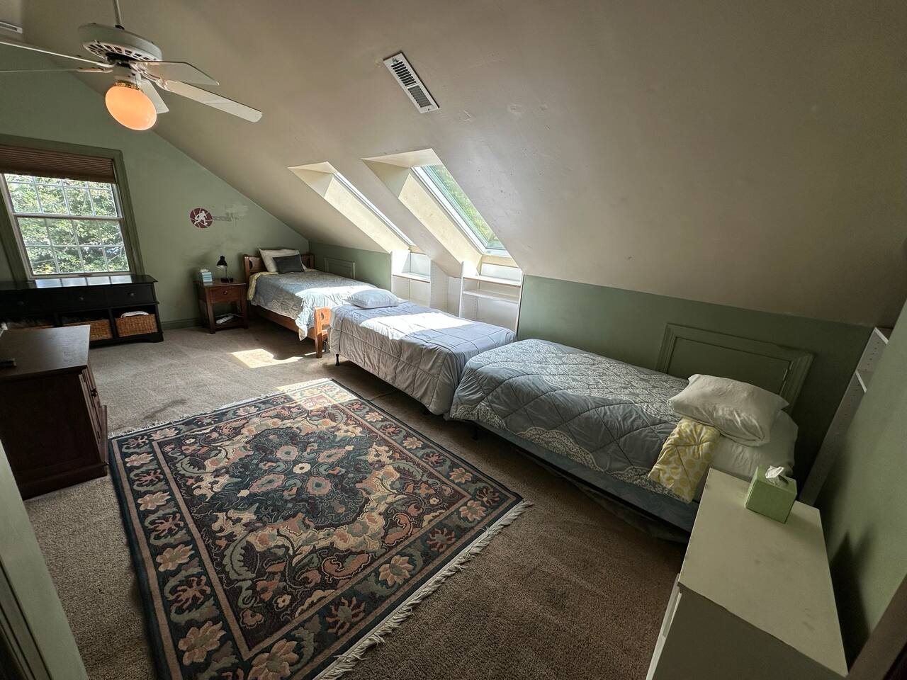 Bedroom 4 (BR4): Three single twin beds (sleeps 3) with Dresser, 2 closets, and 2 sky lights in the ceiling.