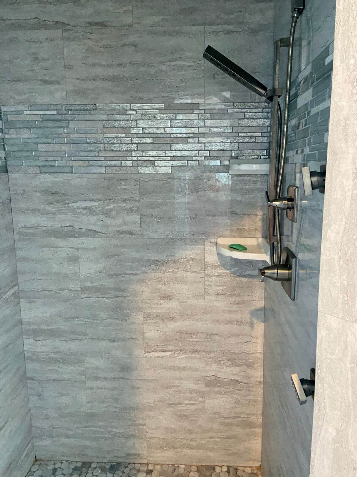 Custom tiled shower in the master bathroom.
