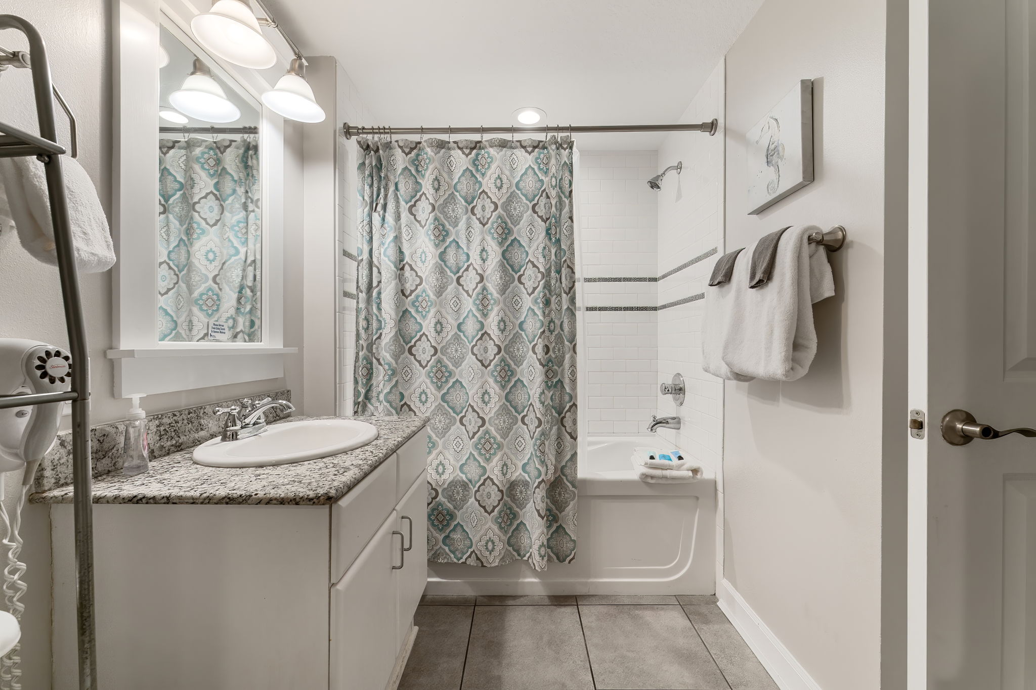 Spacious guest bath.