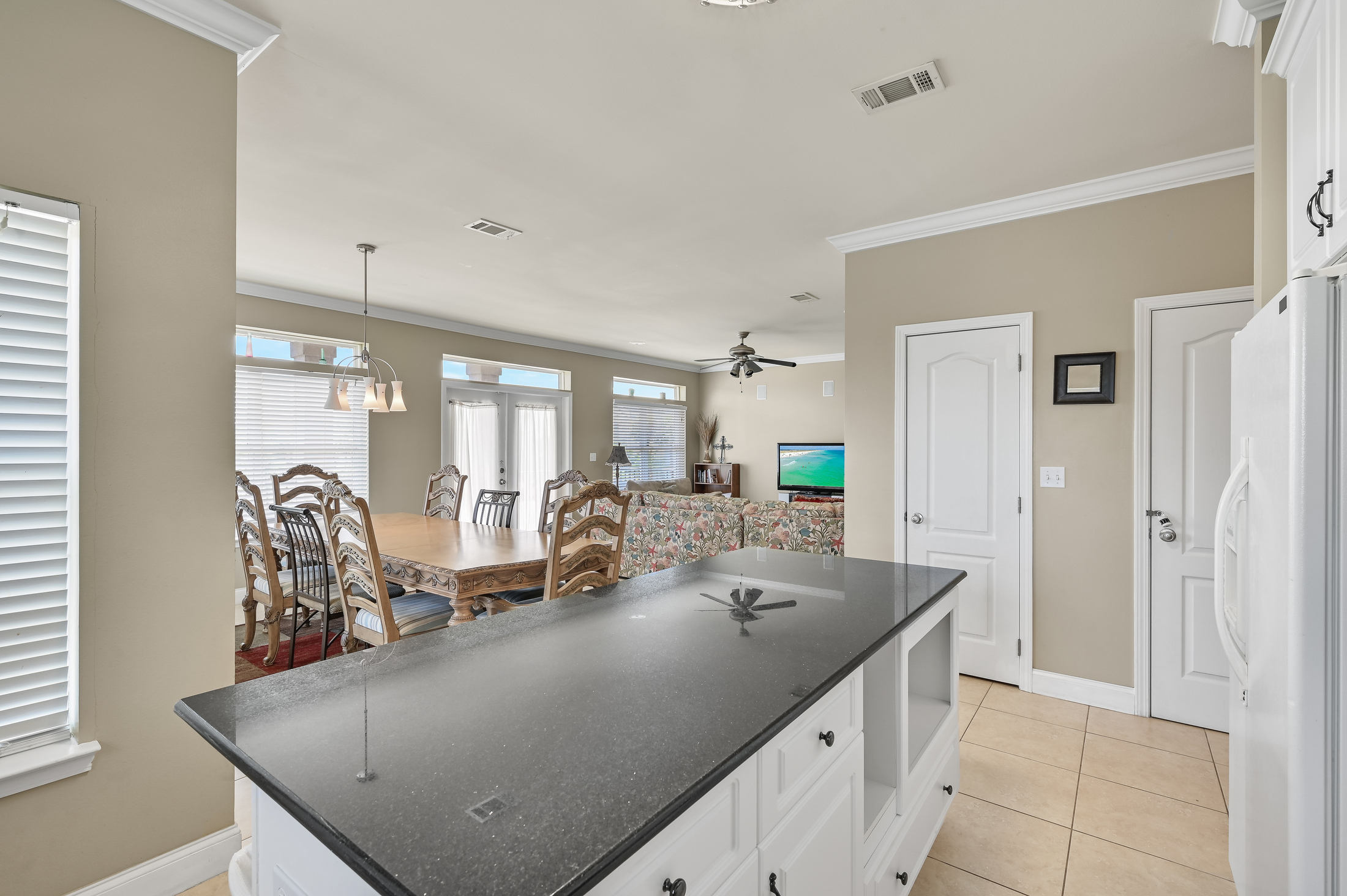 Full Kitchen #2 (Second Floor)–Complete w/ stove/oven, refrigerator, microwave, dishwasher, coffee maker and more   + island seating