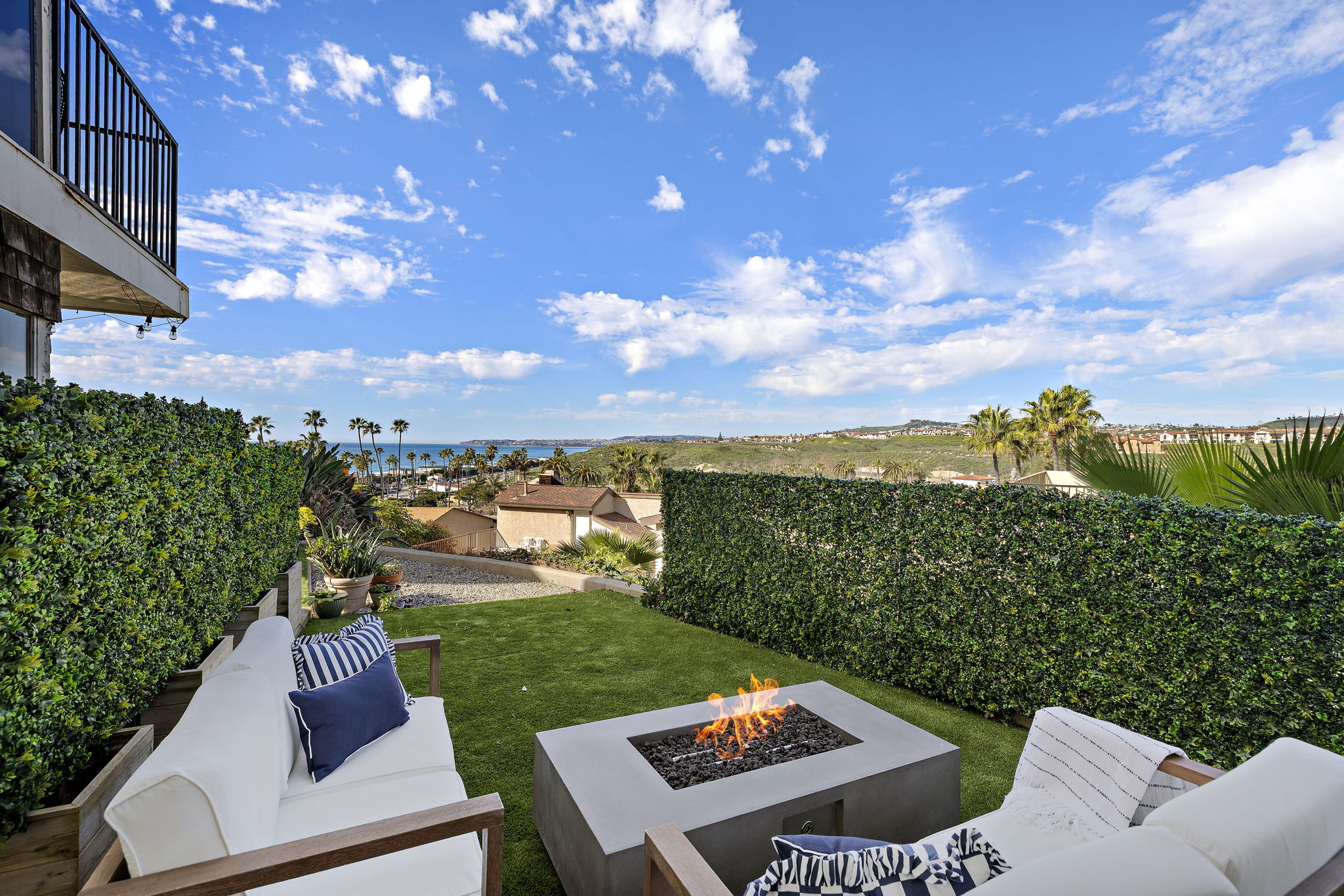 Enjoy morning coffee, sunset drinks, or evenings around the fire pit with friends in your private backyard, taking in the ocean views and relaxed coastal setting