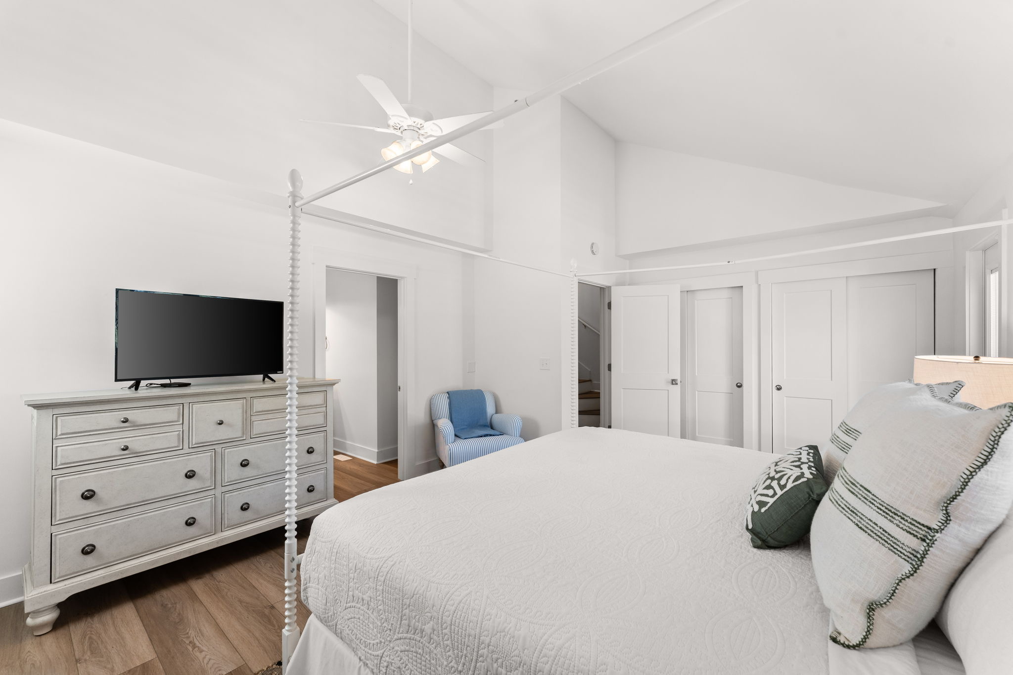 Side B: Relax in the 3rd-floor Master King with a Smart TV and ceiling fan.