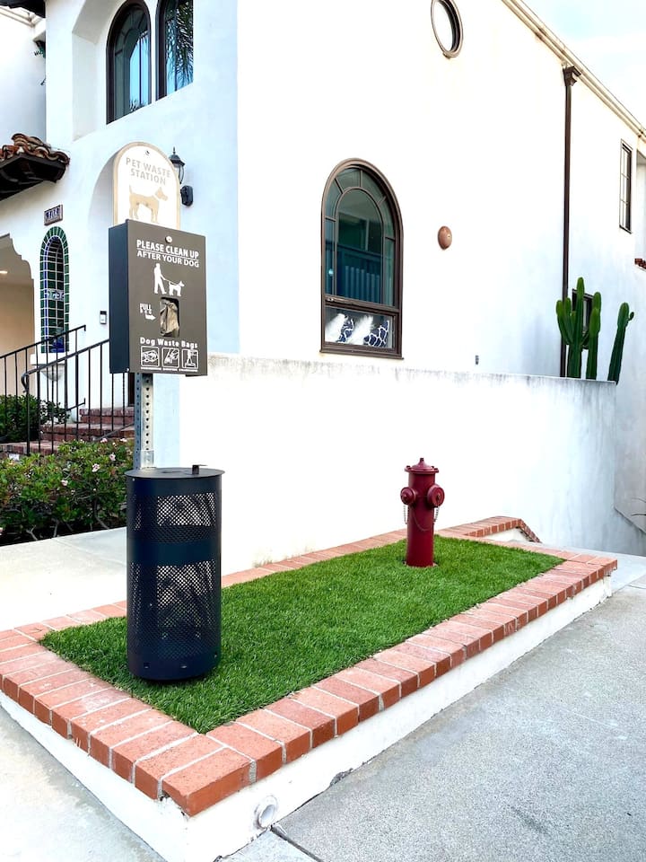 Our condo is pet friendly and even has its own  "Dog Park" designed for dogs to feel like they're on vacation too :)