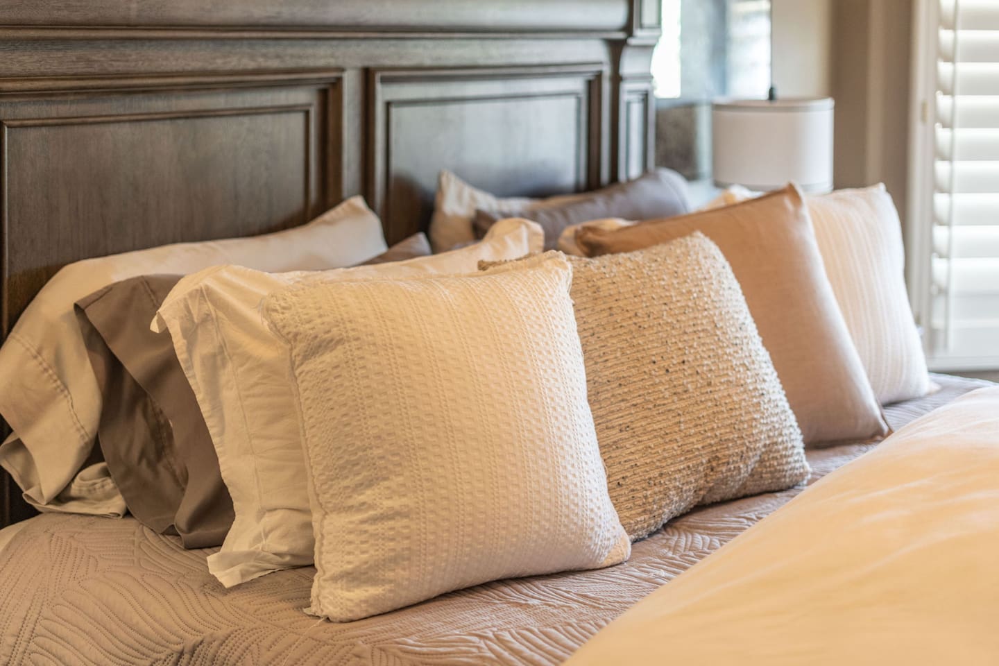Layered with plush pillows and soft neutral linens, the king bed is dressed for deep, restful sleep — because a great vacation starts with a great night's rest.
