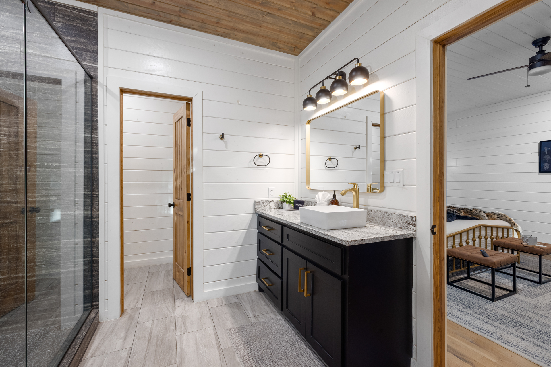 A complete bathroom setup featuring both tub and shower, providing flexibility and convenience throughout your stay