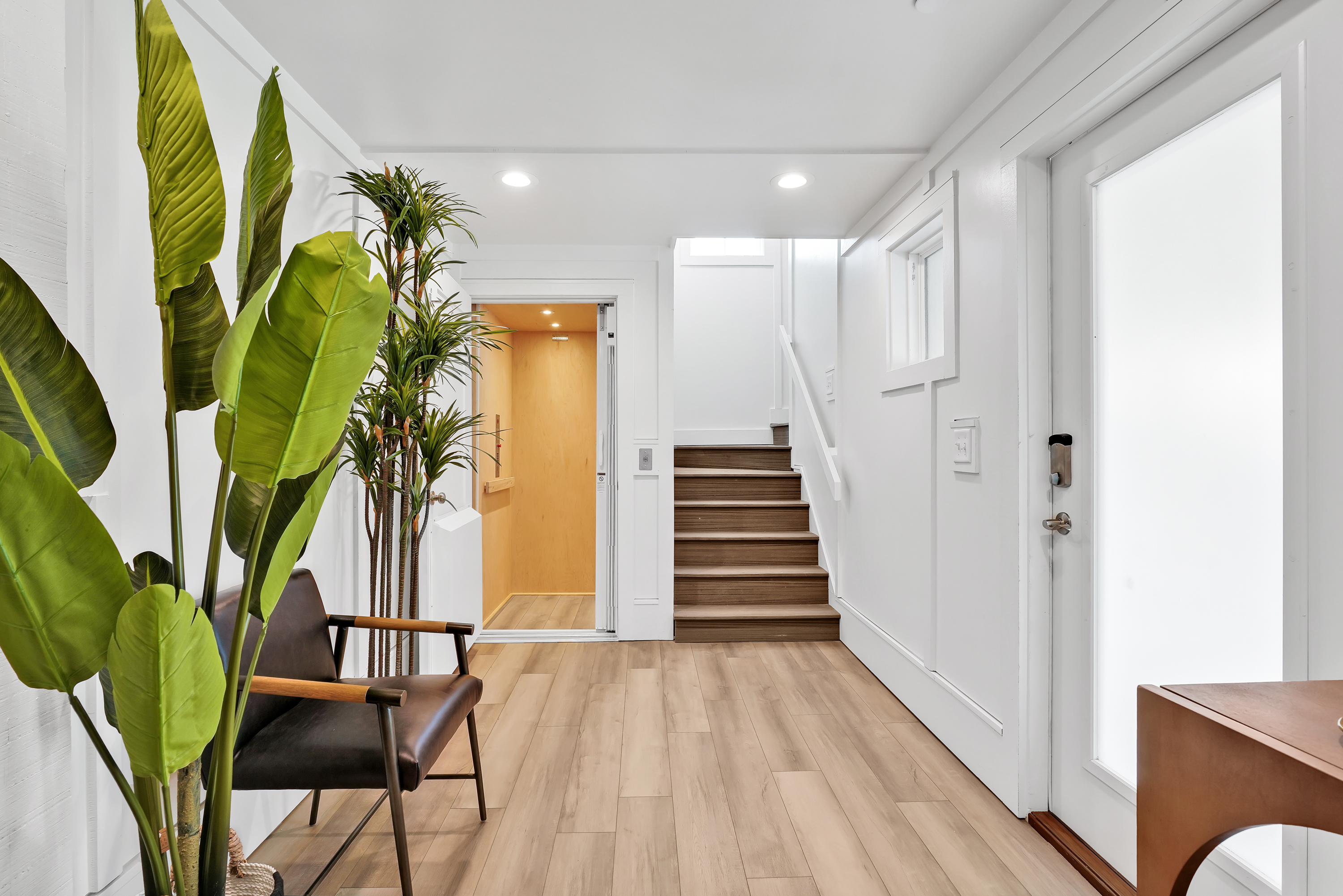 Ground floor entrance to elevator lobby and interior stairs can take you to 1st floor (5 bedrooms), 2nd floor (5 bedrooms), and 3rd floor (2 bedrooms + kitchen and great room)