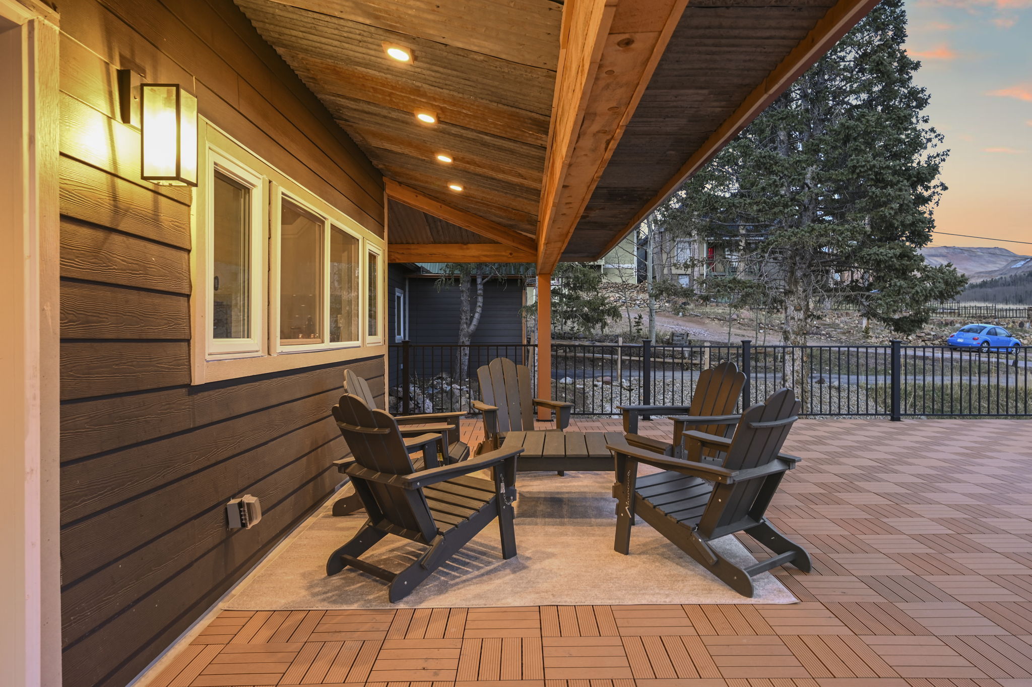 Dine alfresco on the deck while watching the sun set over the mountains