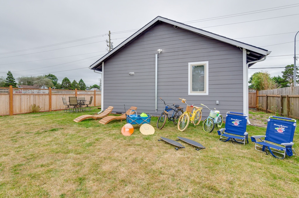 Loads of beach toys including bikes, skim boards, chairs and a wagon to carry.