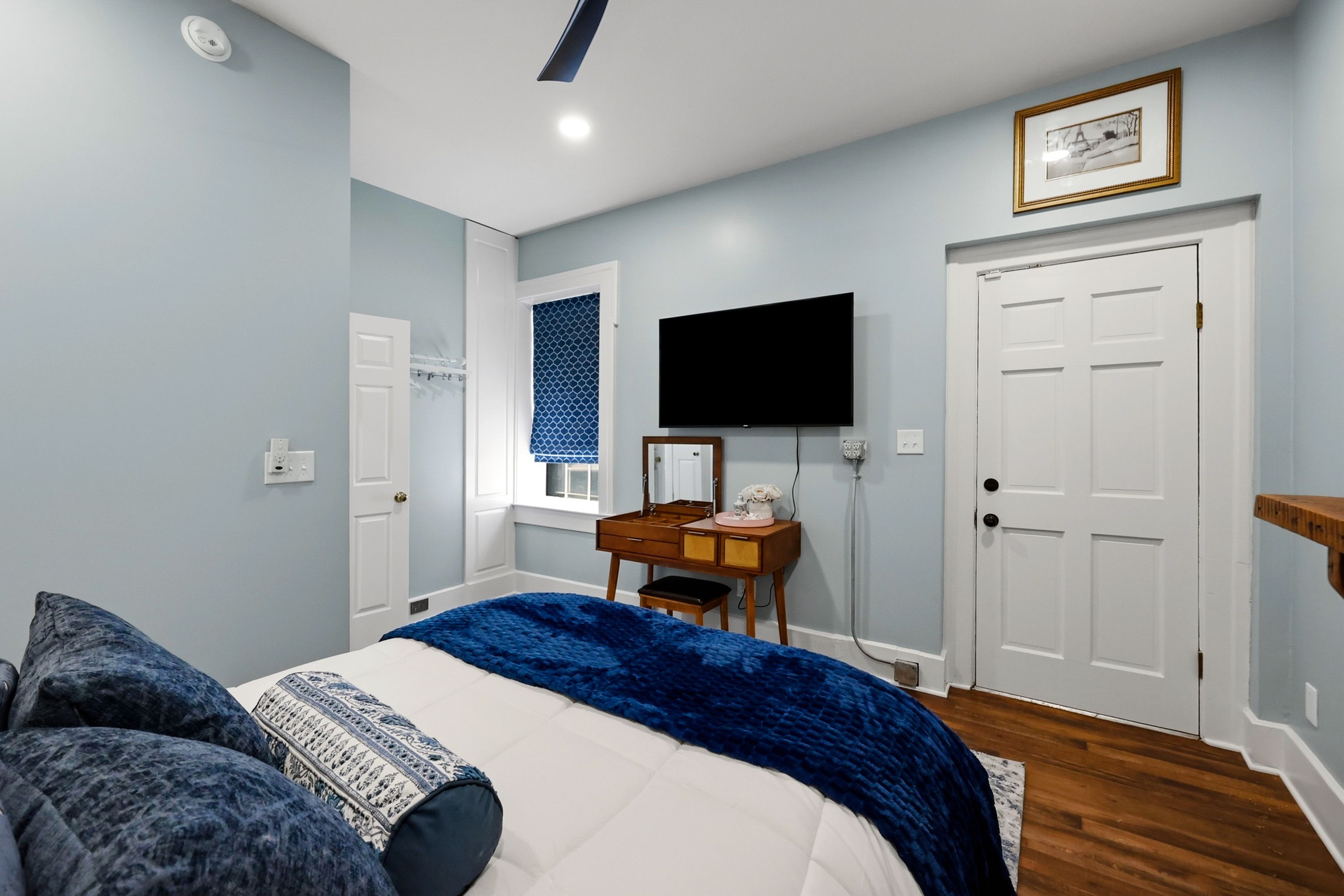 The Grace Room. Comfy queen bed. Dresser and vanity. Access to our garden courtyard and covered patio is through this room.