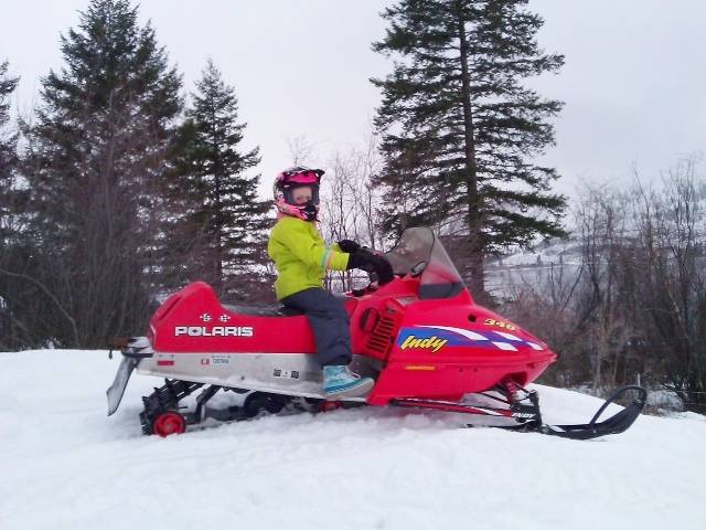 Snowmobiling and Sledding icon
