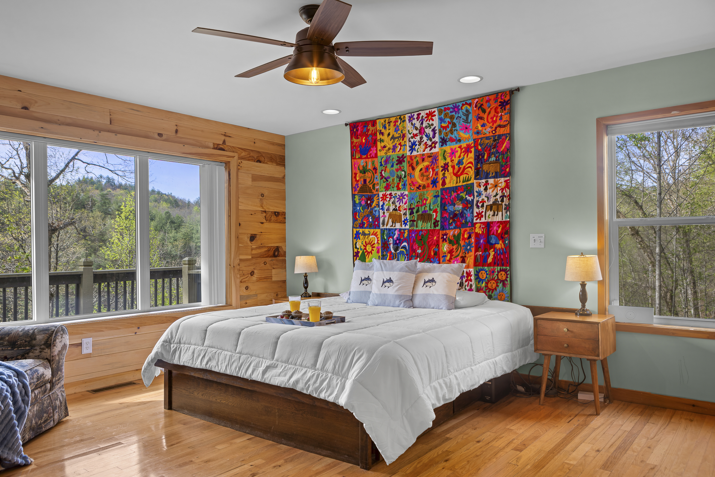 King Bedroom 2: Bright and vibrant room with stunning nature views and artisanal decor!