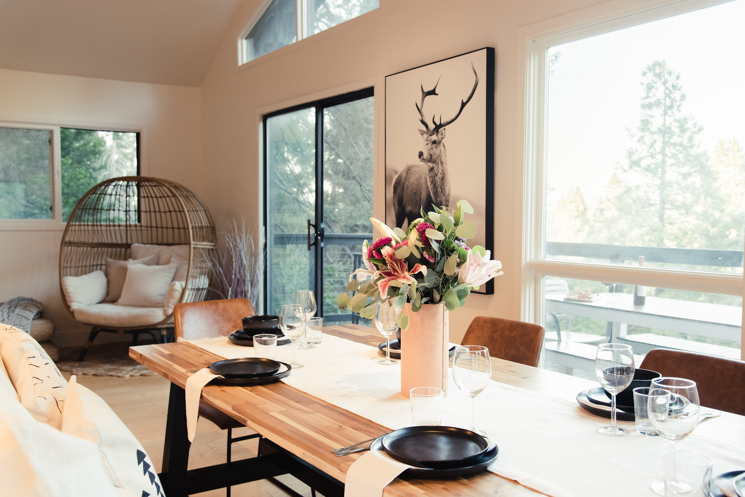 Watch the sunset from your treetop view while enjoying your next meal at Dover Treetop Cabin.