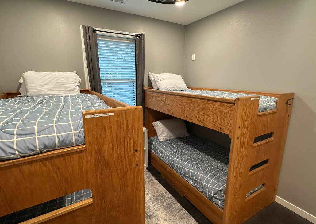 NEW HOUSE: Bedroom 3 with twin over twin bunk bedrs.