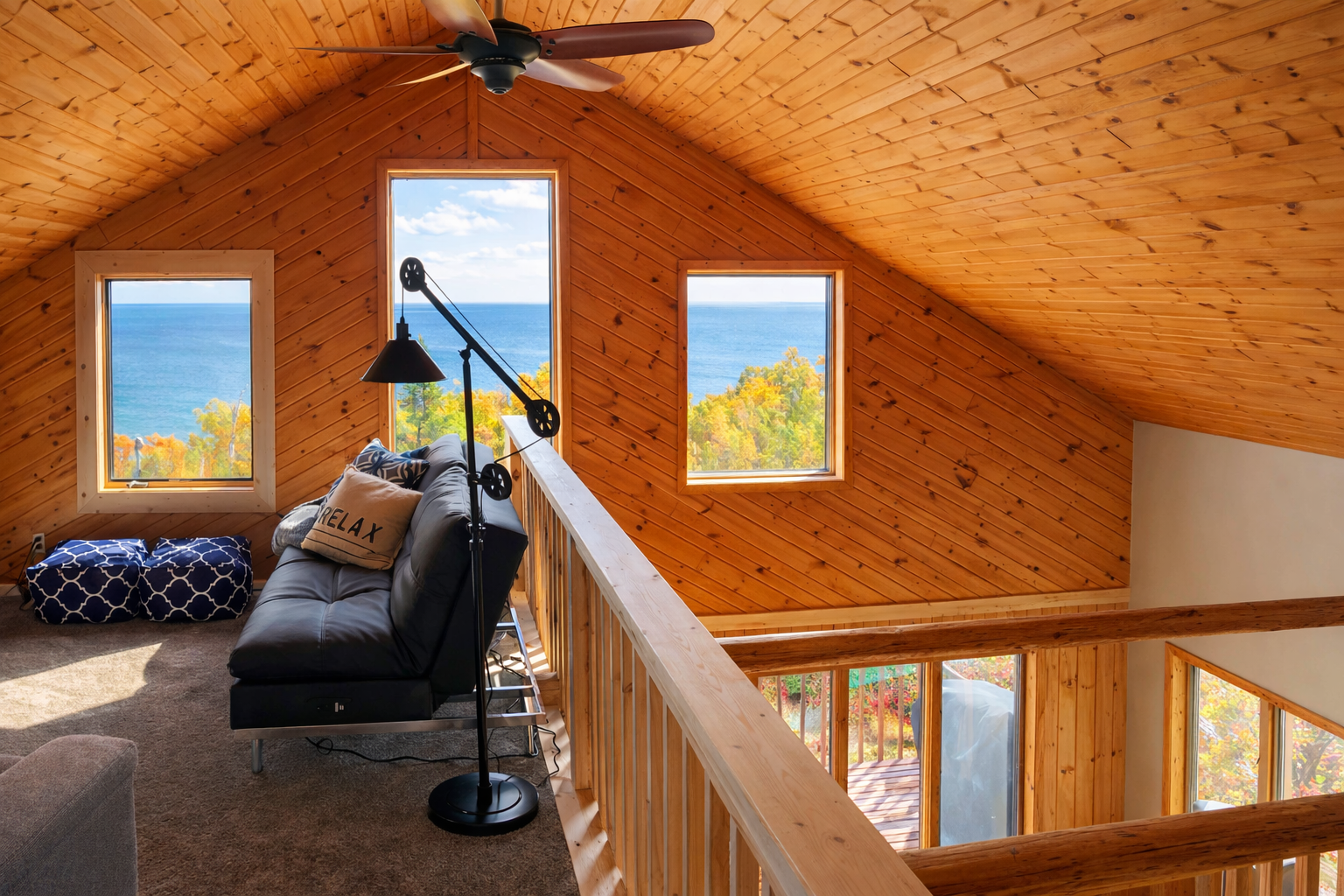 This cozy loft lounge offers stunning Lake Superior views and a perfect place to relax, read, or hang out together. Open to the lower level, it keeps everyone connected while still giving you a peaceful retreat with incredible scenery!