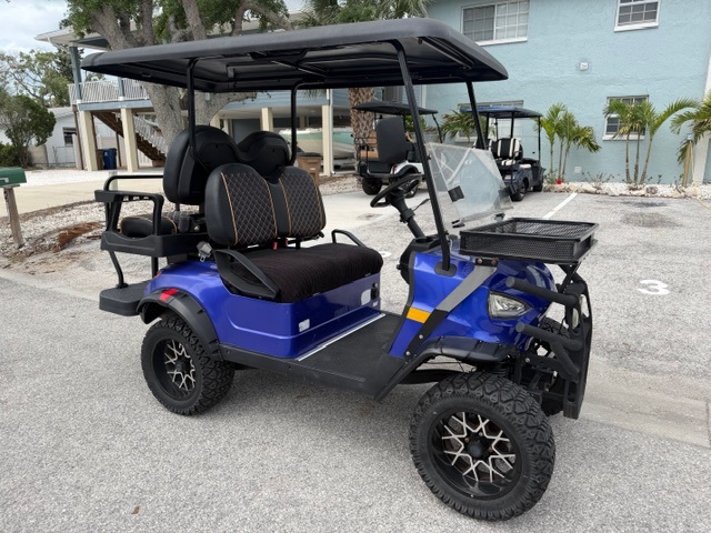 4 person Golf cart included in your rental to enjoy driving around Indian Rocks beach only
