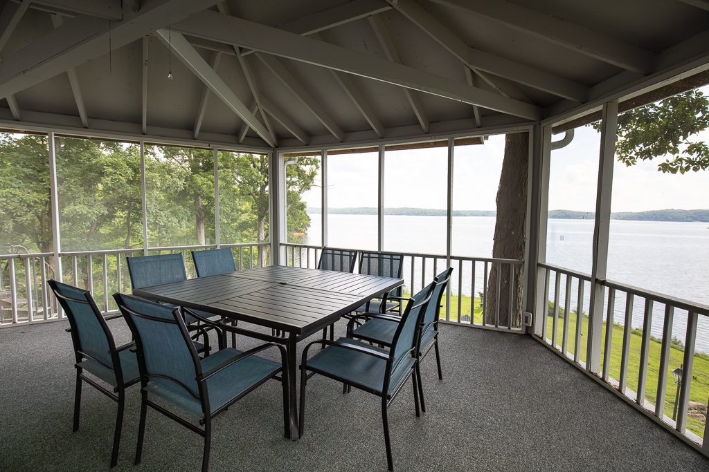 Family game nights, morning coffee, or sunset dinners — this porch is your front-row seat to the lake!