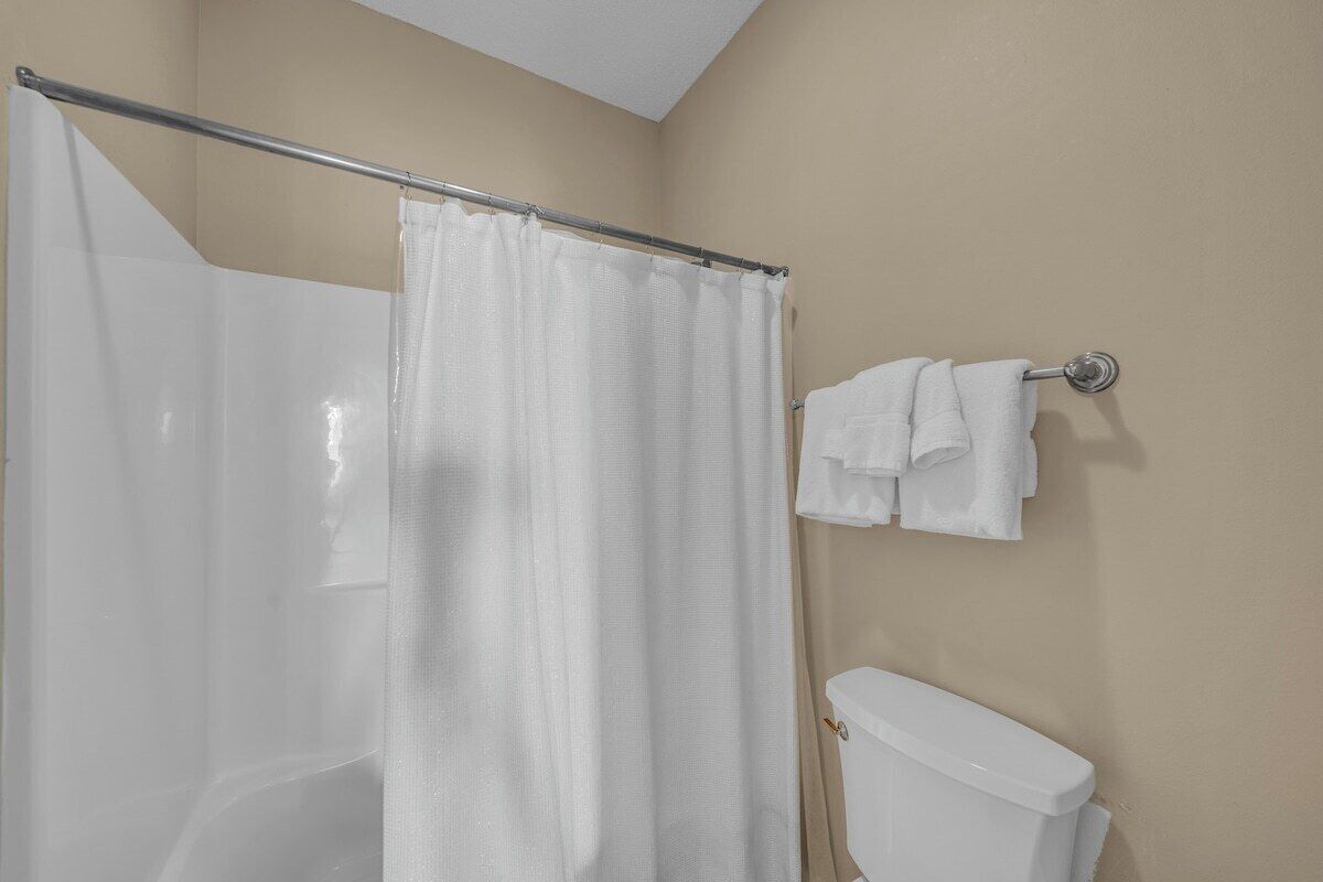 Downstairs bathroom, queen bedroom and living room access