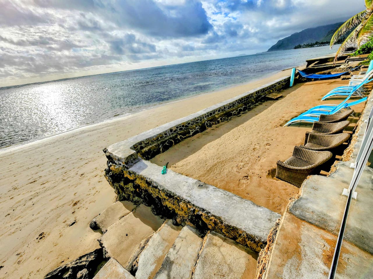 Low Tide.Most guests prefer high tide with water right up against seawall because it gives them privacy in home's own private beach from beach walkers in front of the seawall.Largest sea cliffs in the world where all Jurassic Park movies were filmed