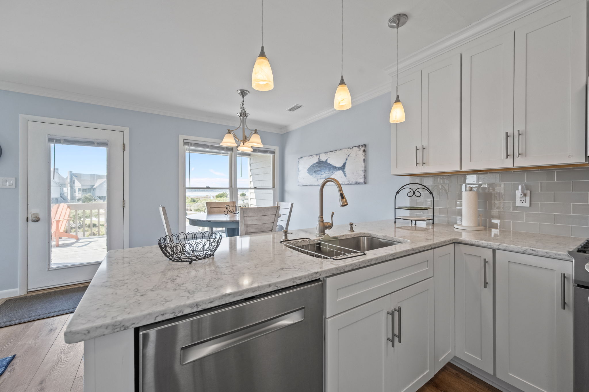 Cook and clean with ease—this kitchen features a dishwasher and plenty of counter space for meal prep.