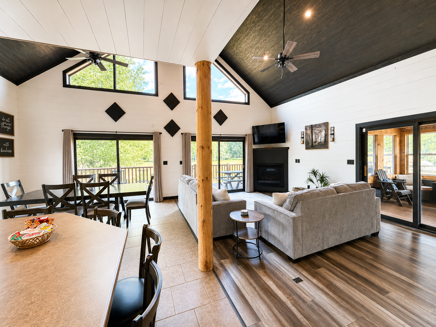 Open kitchen and dining area keeps everyone connected, with plenty of space for group meals, conversation and time together.
