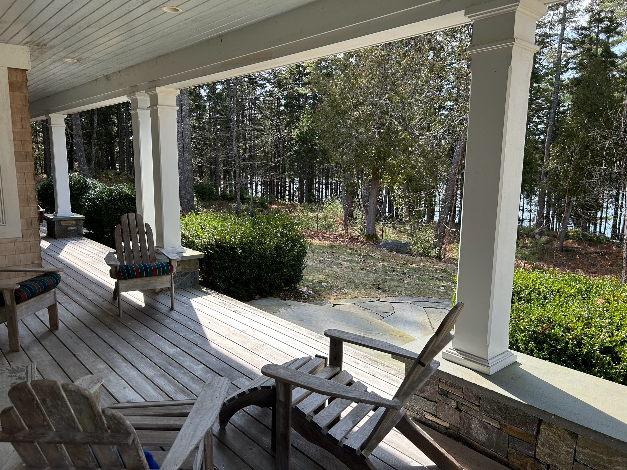Large front porch with ample seating is a great place to relax.